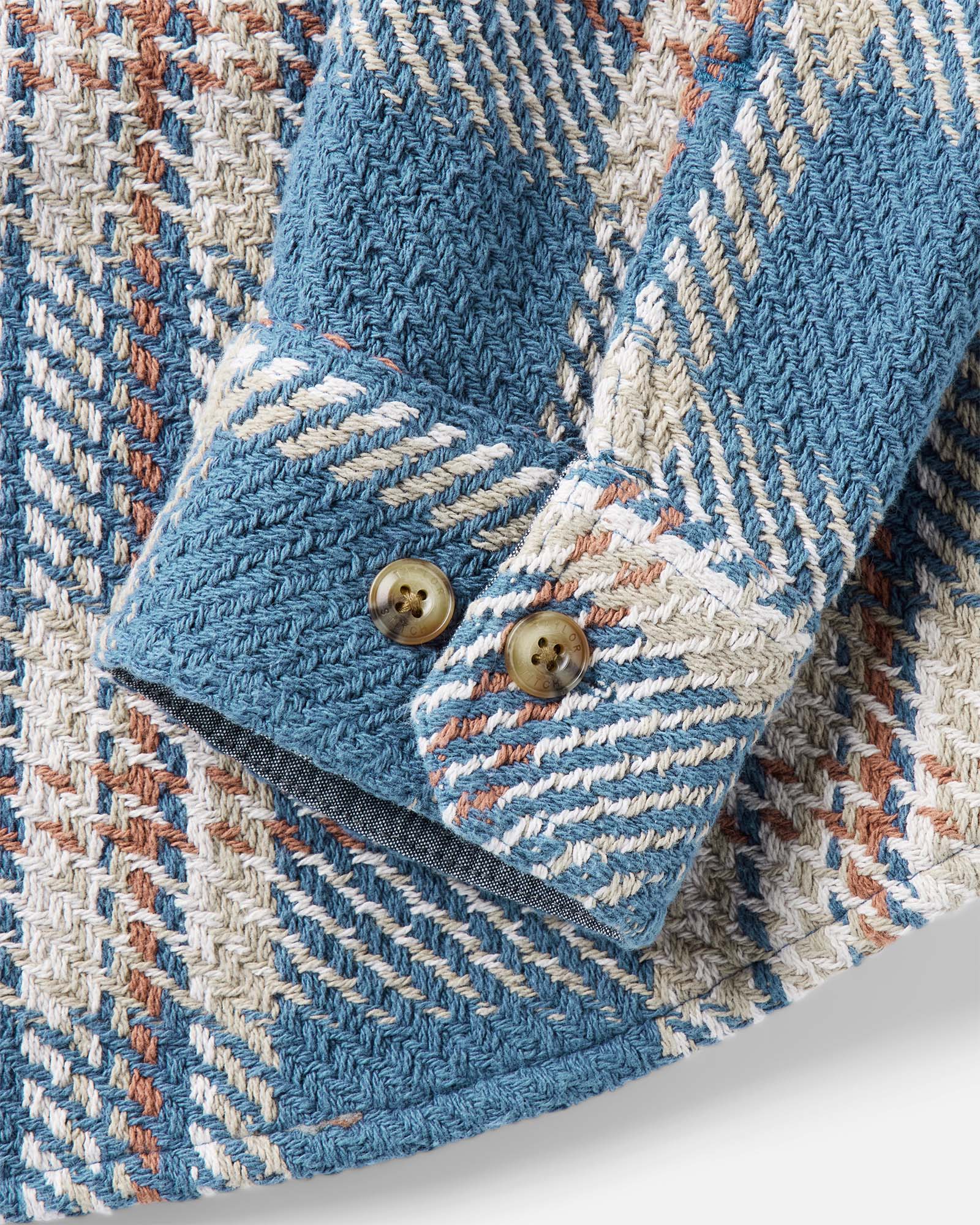 material shot of the sleeve on The Cutter Overshirt in Ocean Plaid, Wovens by Taylor Stitch