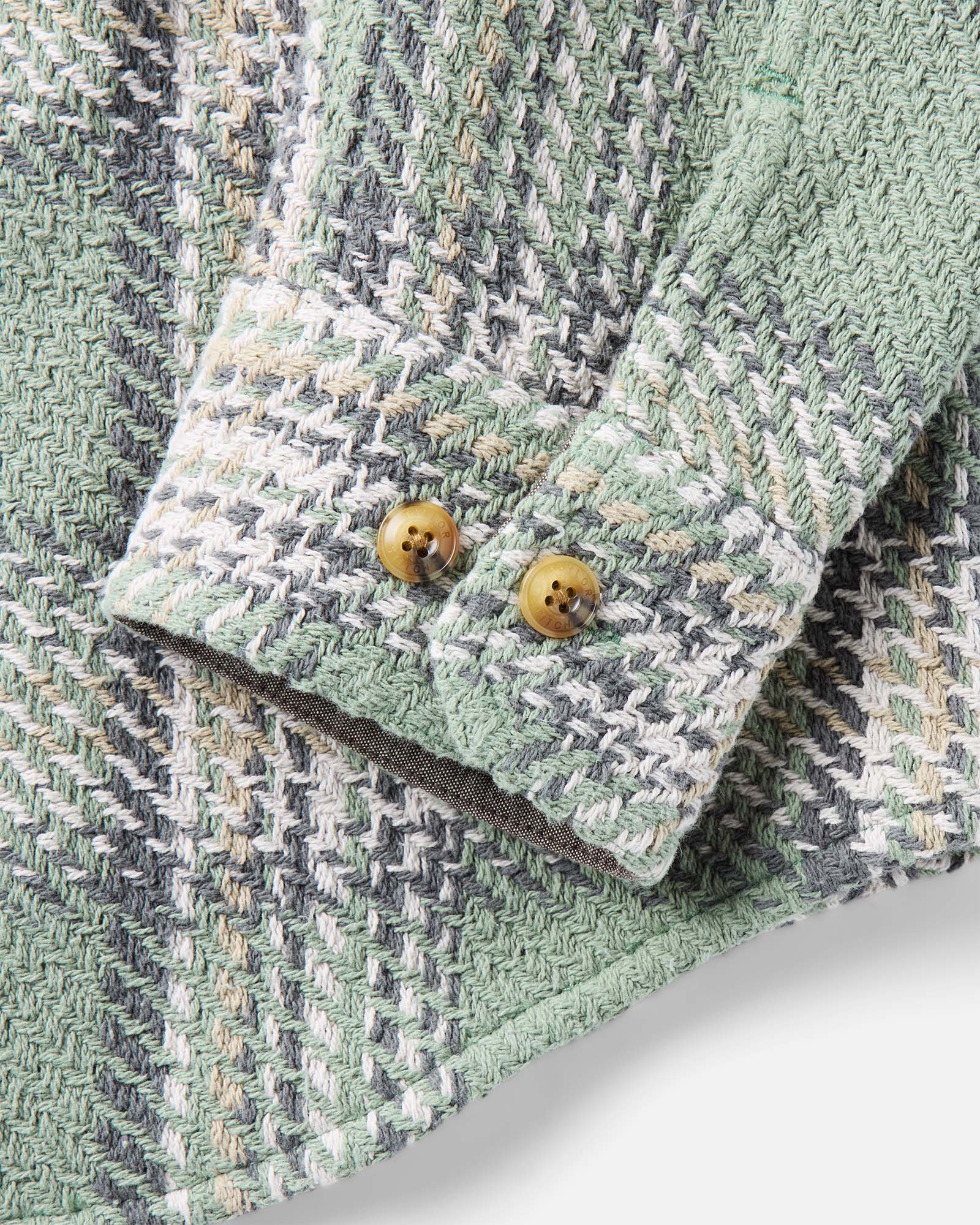 material shot of the sleeve on The Cutter Overshirt in Sage Plaid, Wovens by Taylor Stitch