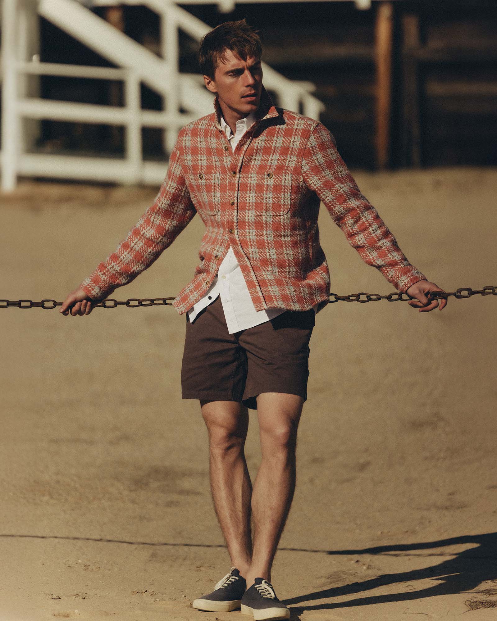 fit model showing off The Cutter Overshirt in Salmon Plaid, Wovens by Taylor Stitch