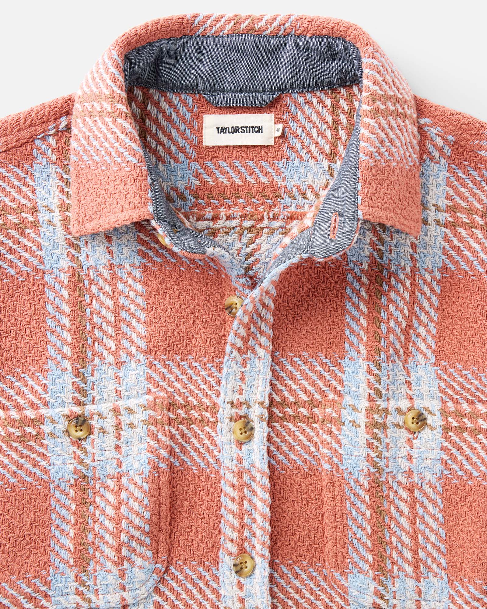 material shot of the collar on The Cutter Overshirt in Salmon Plaid, Wovens by Taylor Stitch
