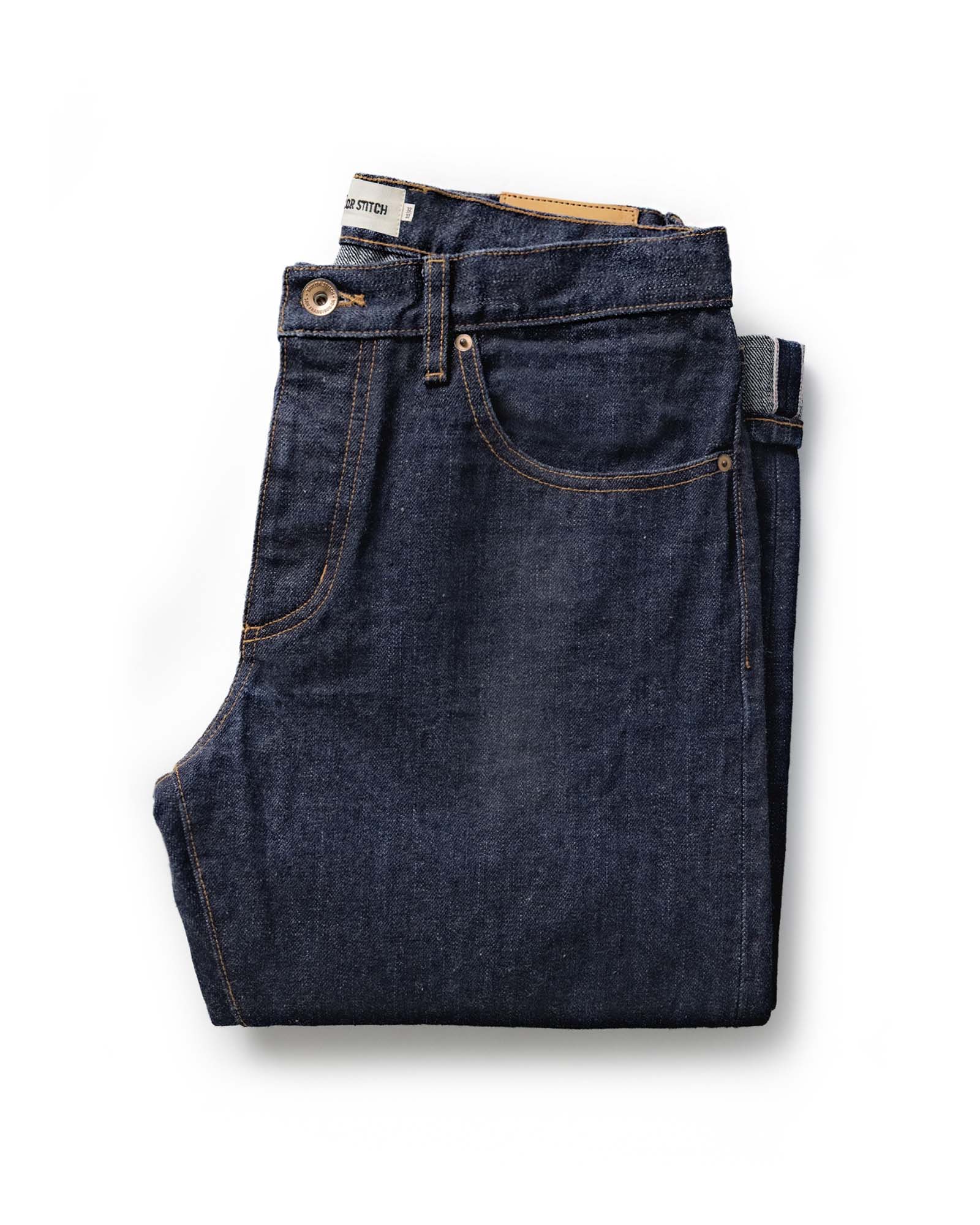folded flatlay of The Democratic Jean in Rinsed Yoshiwa Selvedge, Bottoms by Taylor Stitch