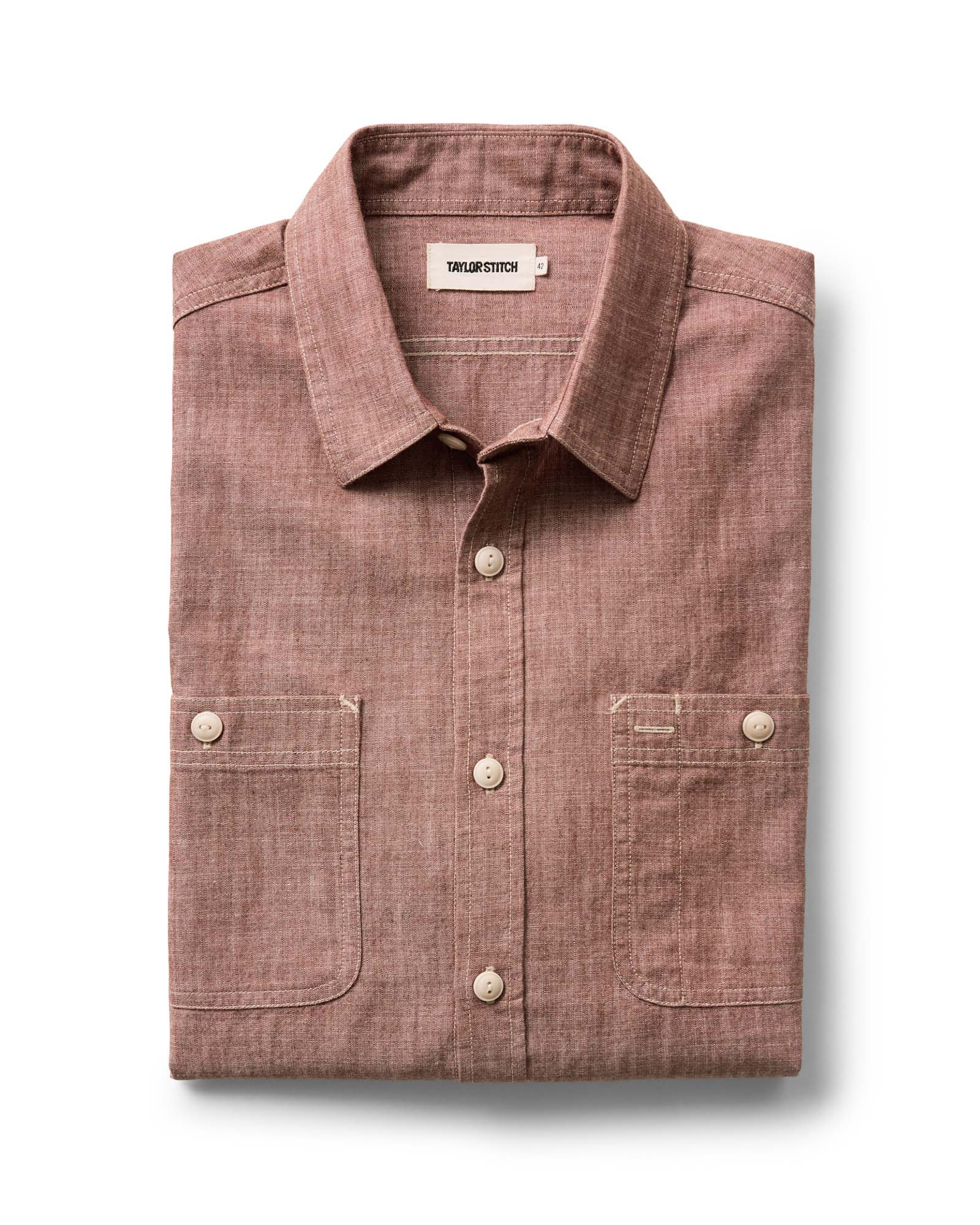 folded flatlay of The Foundry Shirt in Brick Chambray, Wovens by Taylor Stitch