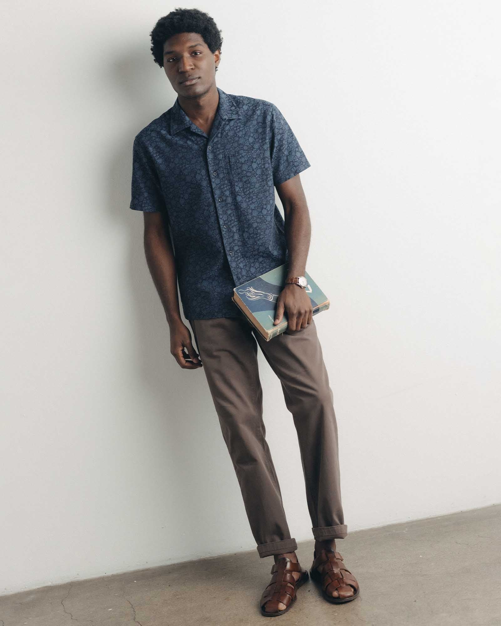 fit model leaning against the wall wearing The Hawthorne Shirt in Japanese Night Bloom Jacquard, Wovens by Taylor Stitch