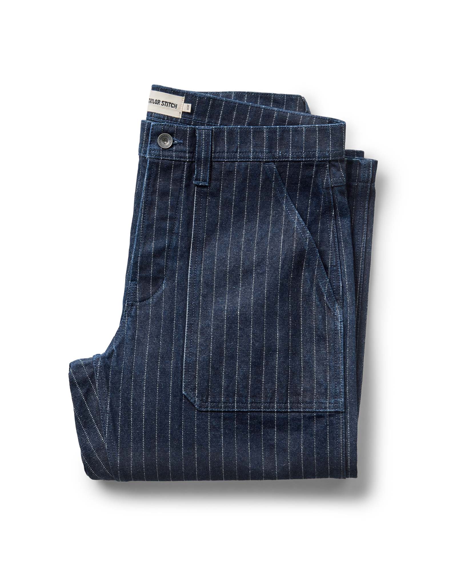 folded flatlay of The Mariner Jean in Rinsed Indigo Dobby Denim, Bottoms by Taylor Stitch