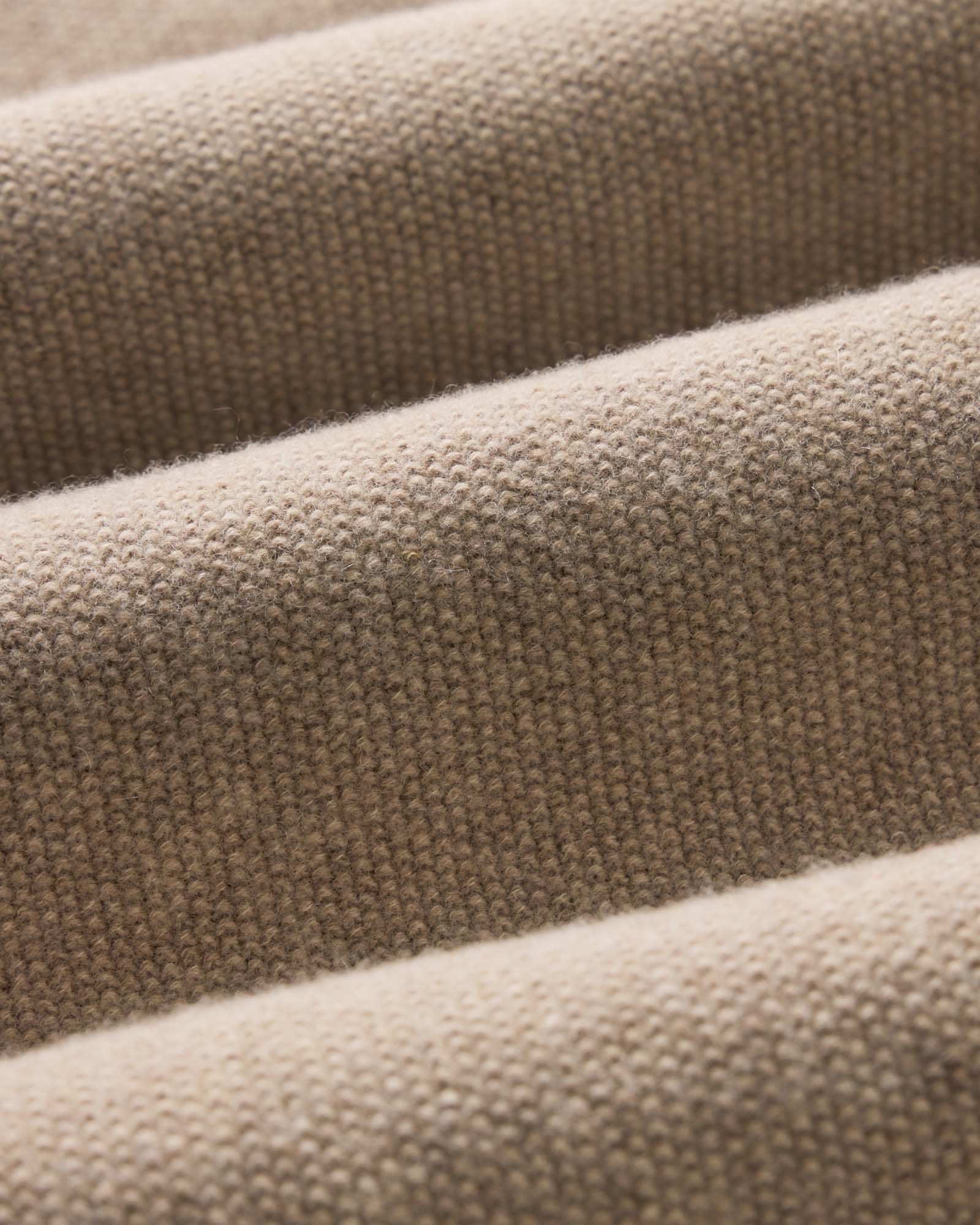material shot of the fabric on The Newton Sweater Polo in Heather Oatmeal, Knits by Taylor Stitch