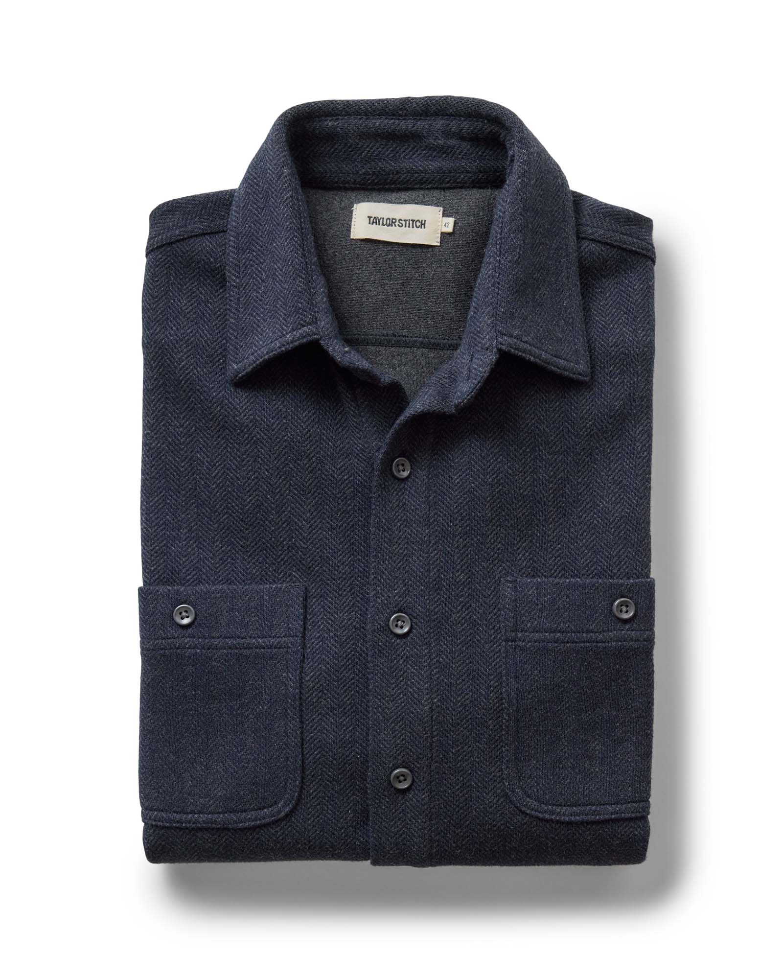 folded flatlay of The North Shore Knit Shirt in Heather Navy, Knits by Taylor Stitch