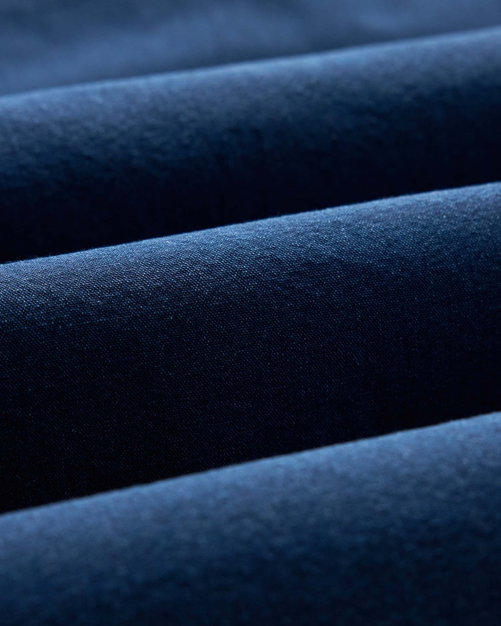 material shot of the fabric on The Short Sleeve Jack in Rinsed Indigo Oxford, Wovens by Taylor Stitch