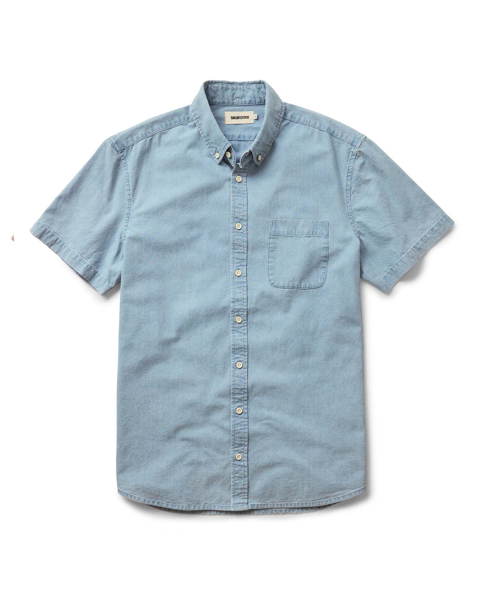 flatlay of The Short Sleeve Jack in Washed Indigo Oxford, Wovens by Taylor Stitch