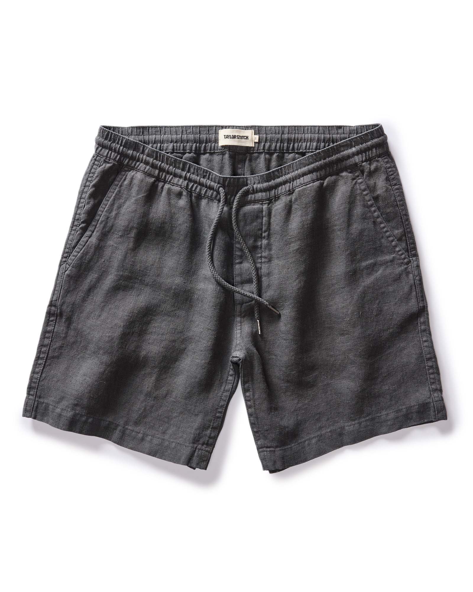 flatlay of The Apres Short in Faded Black Hemp, Bottoms by Taylor Stitch