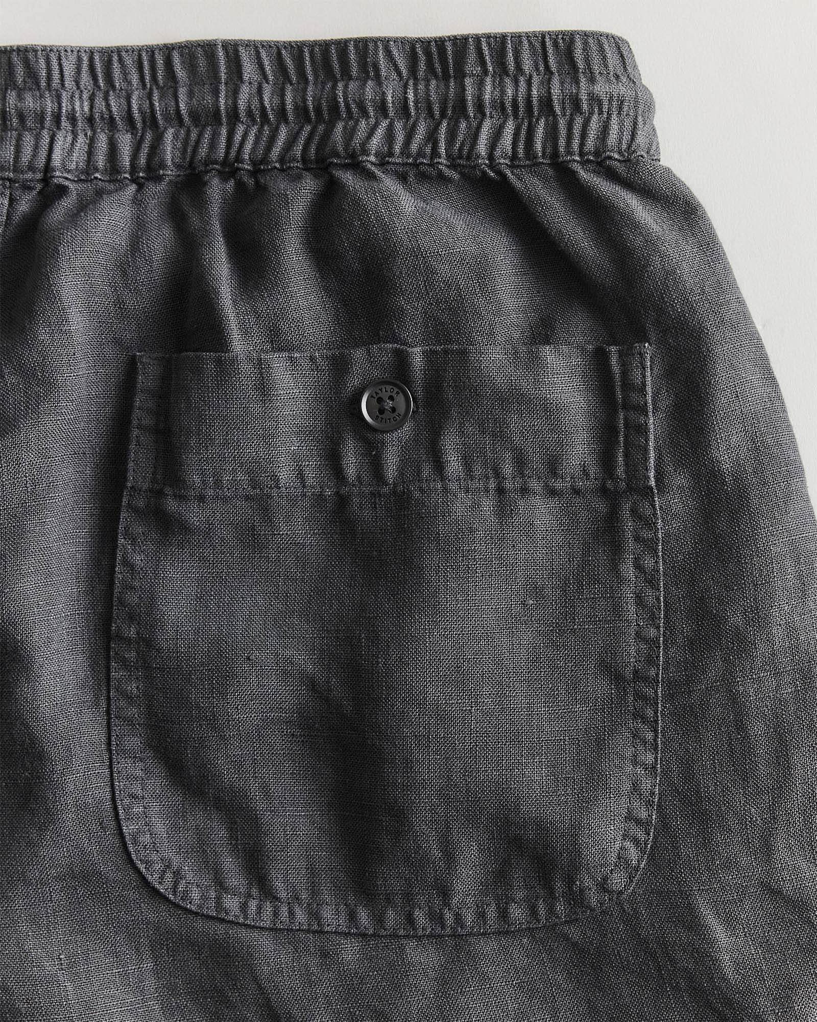 material shot of the back pocket on The Apres Short in Faded Black Hemp, Bottoms by Taylor Stitch