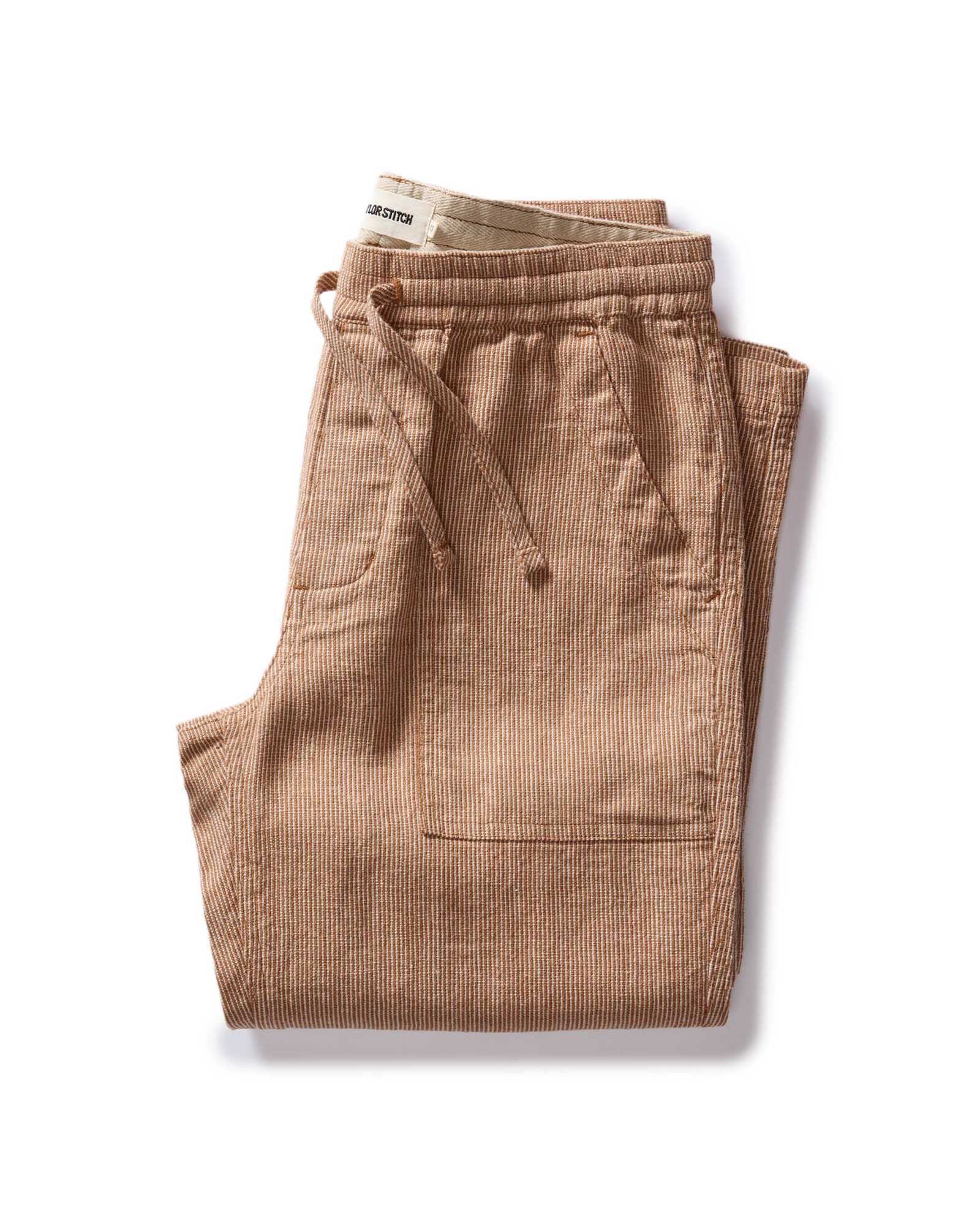 folded flatlay of The Breakwater Pant in Chili Stripe, Bottoms by Taylor Stitch