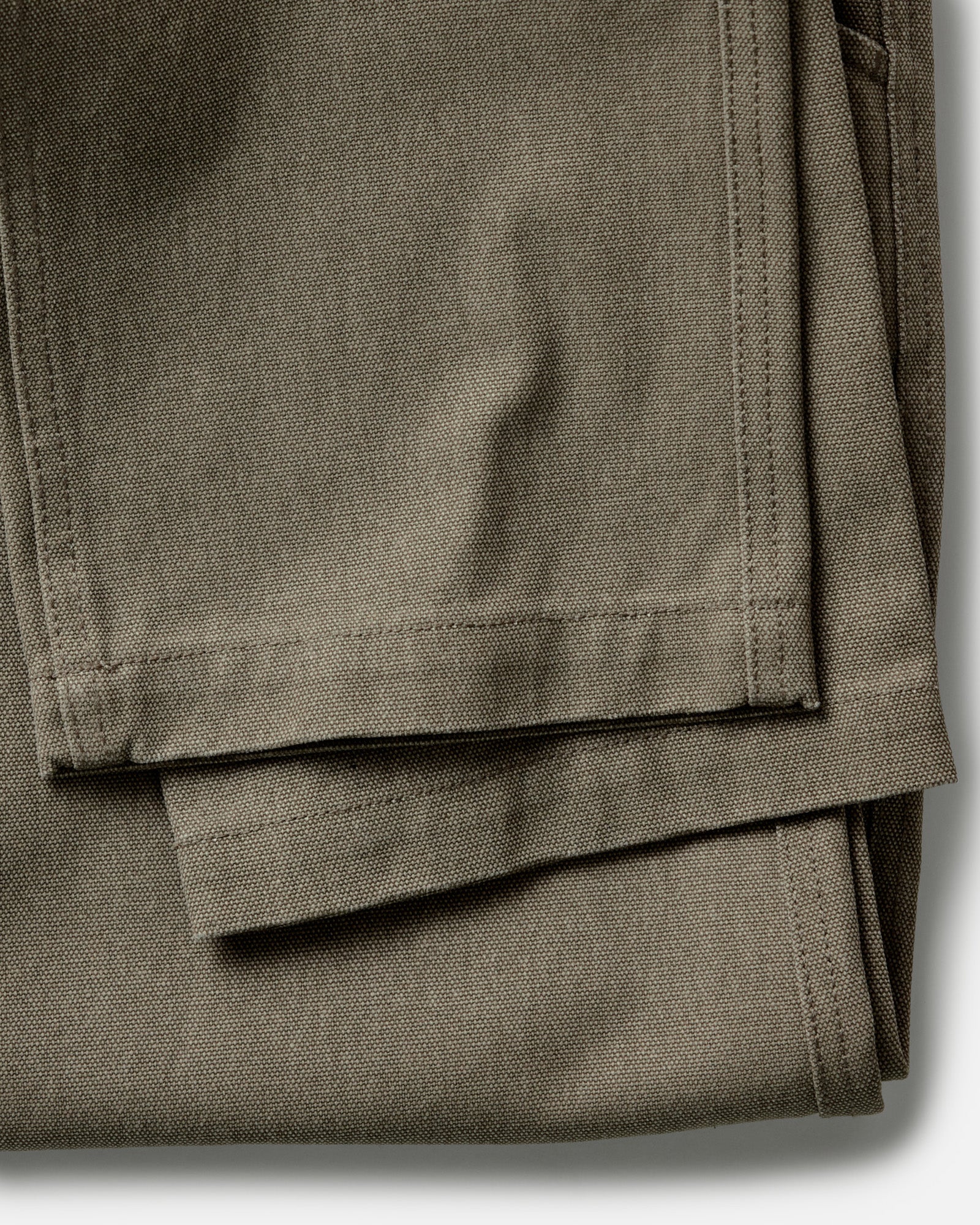 folded flatlay of the back of The Camp Pant in Stone Chipped Canvas, Bottoms by Taylor Stitch