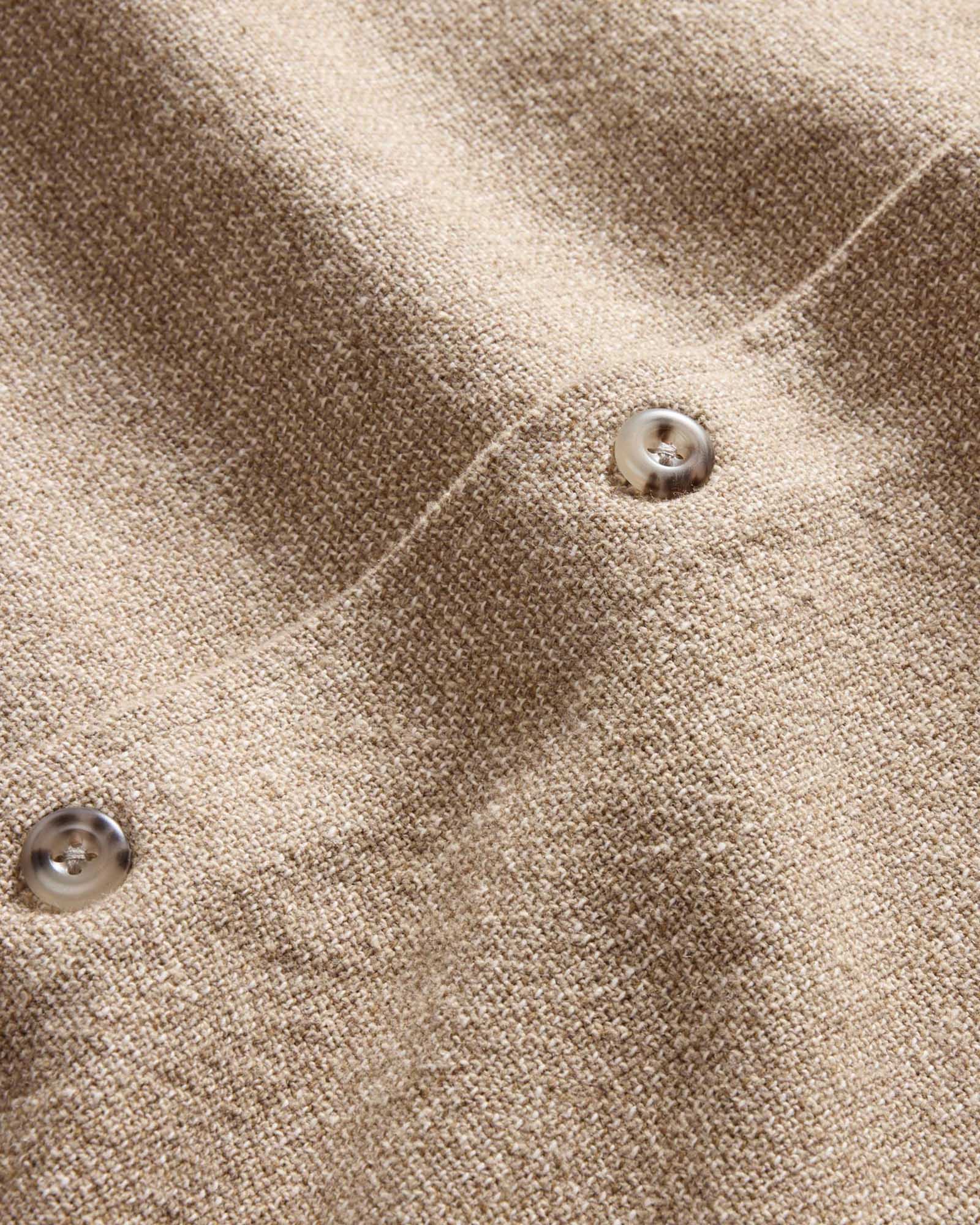 material shot of the buttons on The Point Shirt in Heather Oat Linen Tweed, Wovens by Taylor Stitch