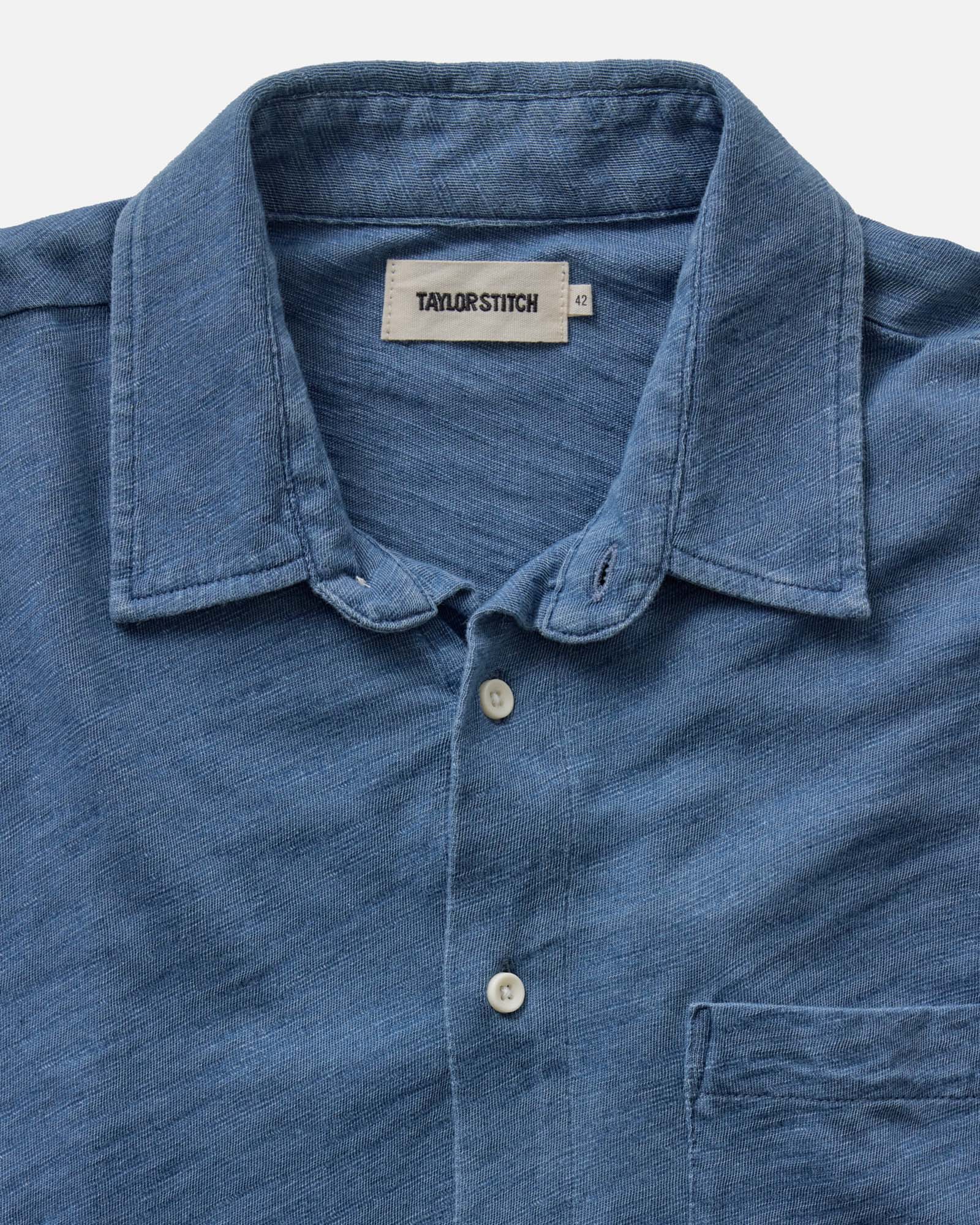 fit model showing off the back of The Short Sleeve California in Washed Indigo Slub, Wovens by Taylor Stitch