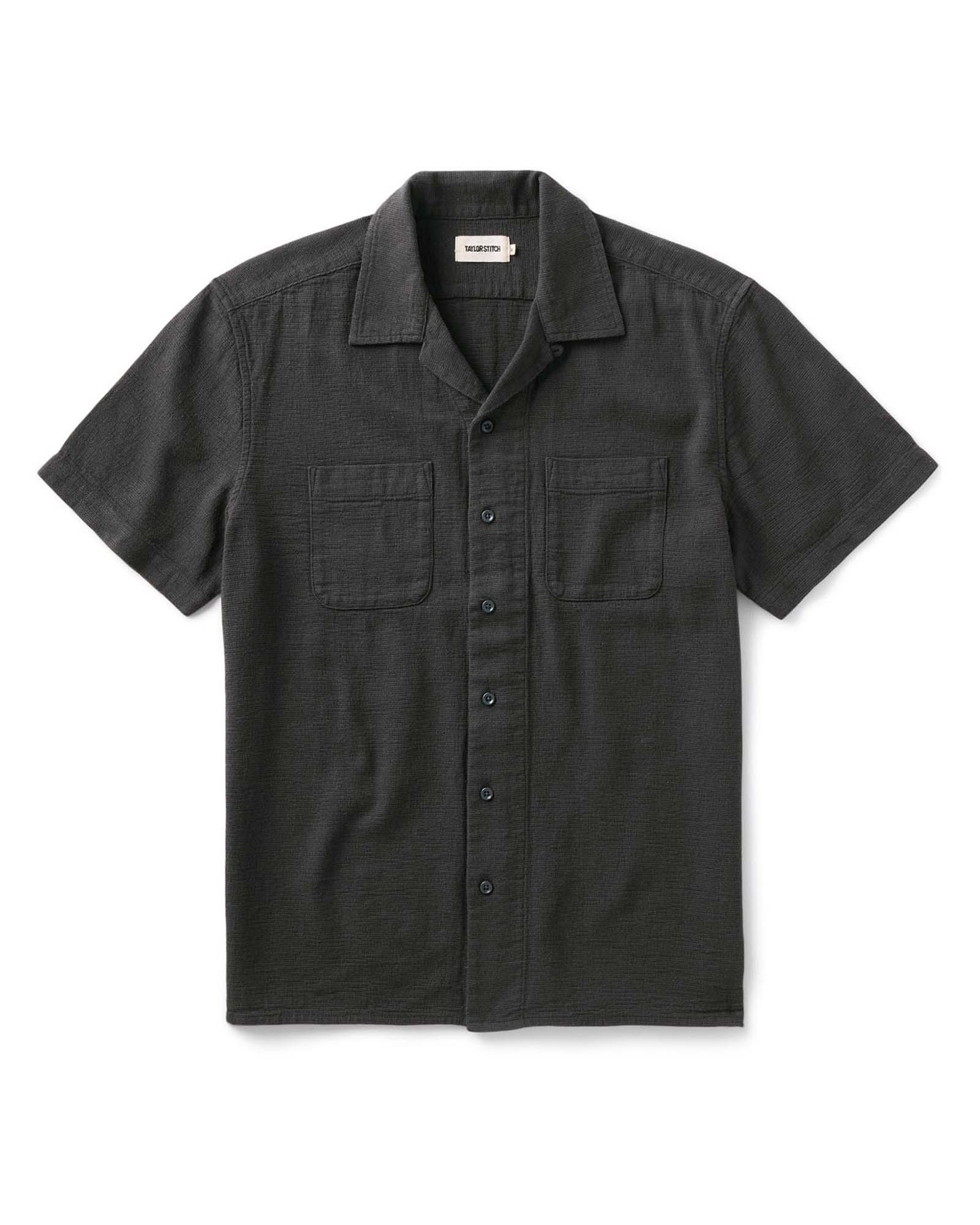 flatlay of The Conrad Shirt in Faded Black Linen, Wovens by Taylor Stitch