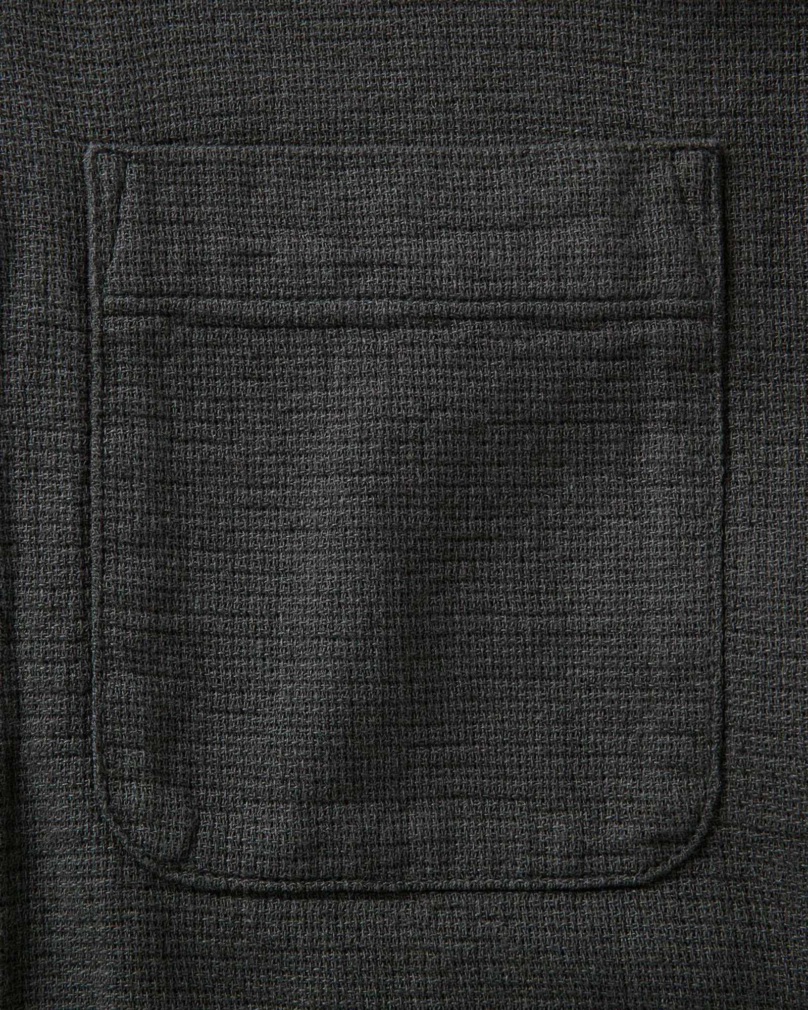 material shot of the collar on The Conrad Shirt in Faded Black Linen, Wovens by Taylor Stitch