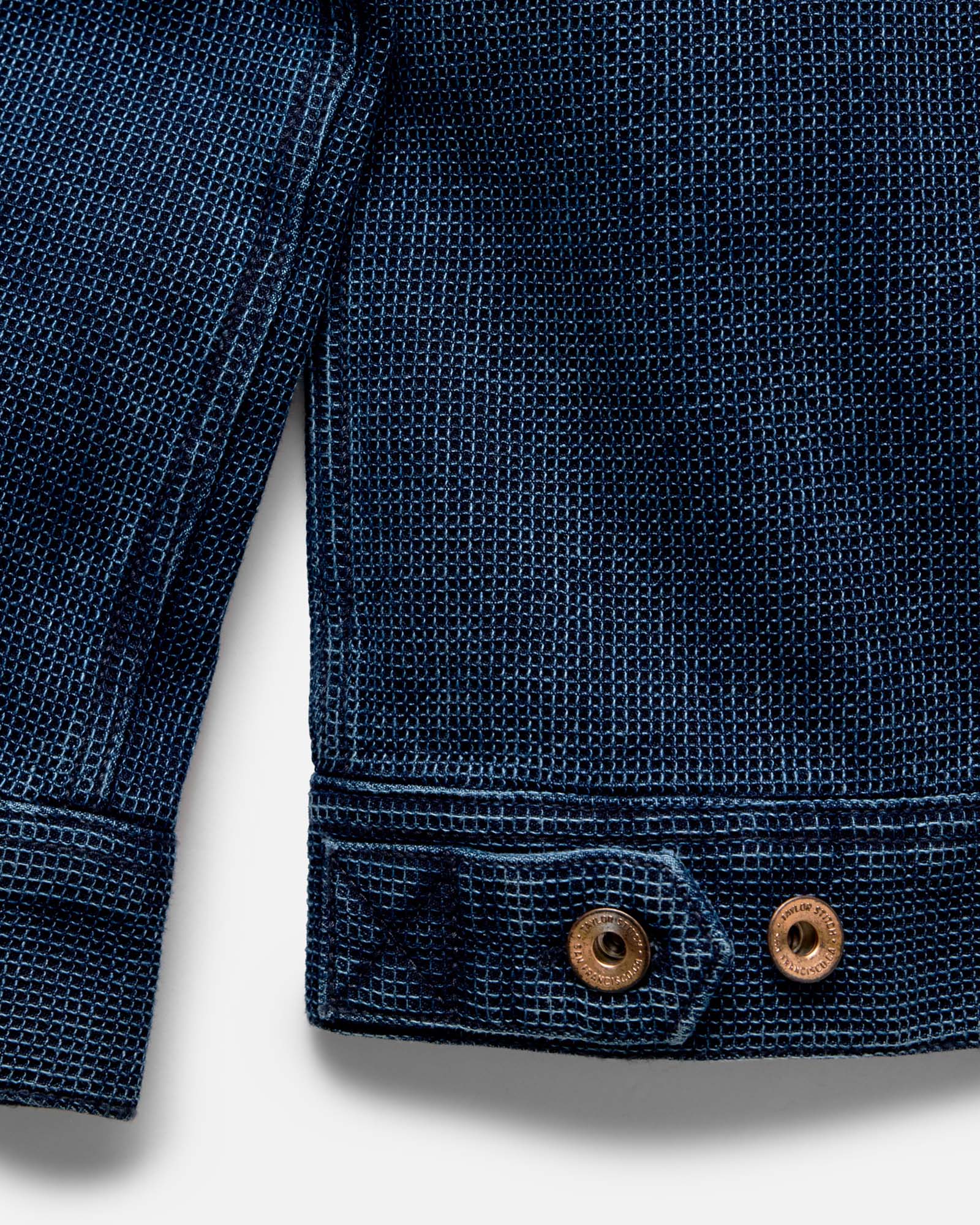 Close up of the sleeves on The Long Haul Jacket in Rinsed Indigo Waffle, Outerwear by Taylor Stitch