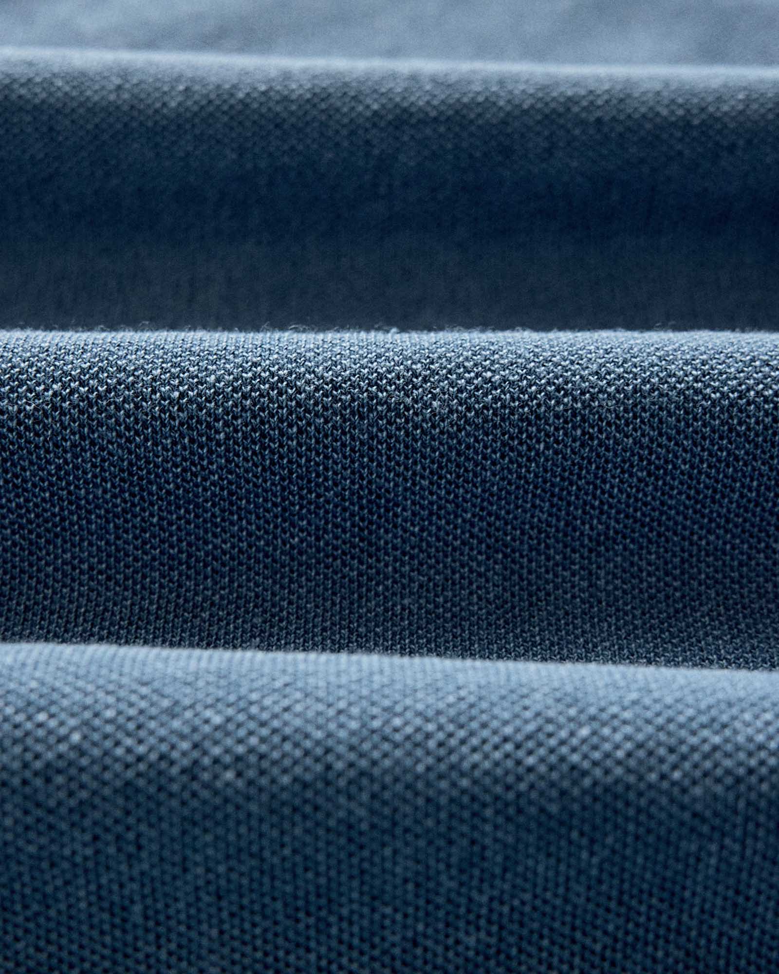 material shot of the fabric on The Pacific Polo in Washed Indigo Pique, Knits by Taylor Stitch