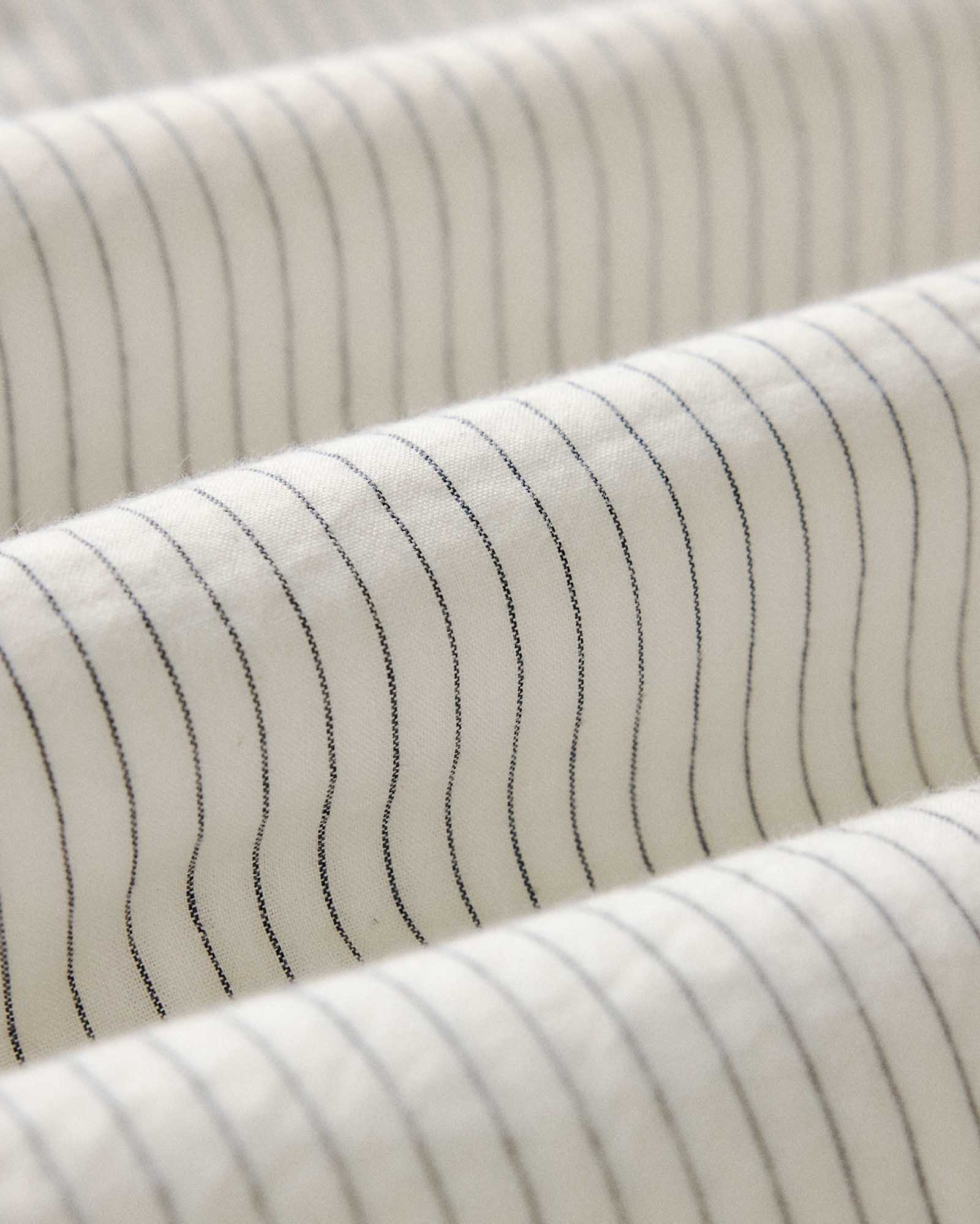 material shot of the fabric on The Short Sleeve Jack in Indigo Stripe, Wovens by Taylor Stitch