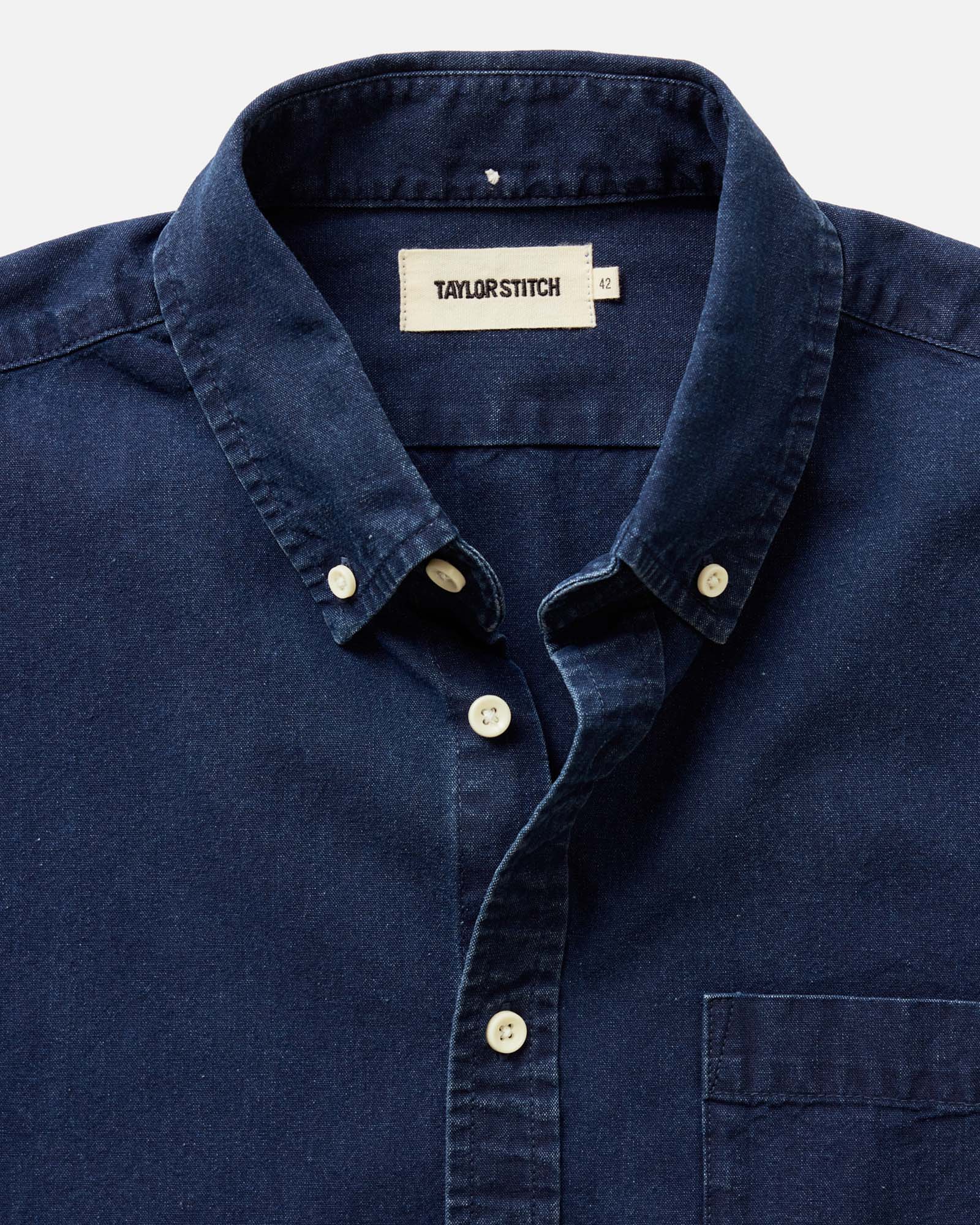 editorial image of The Short Sleeve Jack in Rinsed Indigo Oxford hanging, Wovens by Taylor Stitch