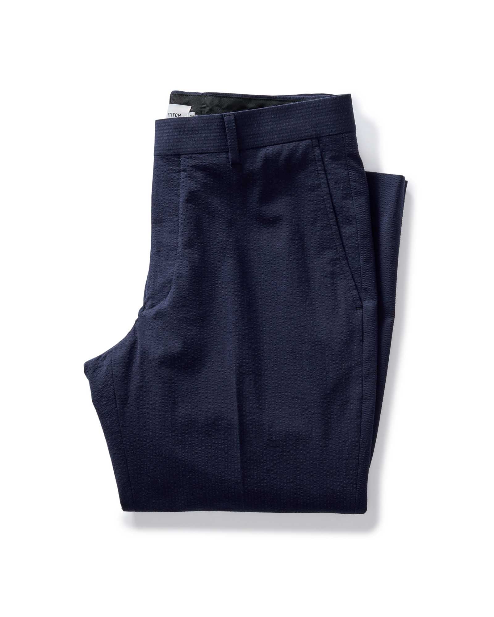 folded flatlay of The Stevens Trouser in Navy Linen Seersucker, Bottoms by Taylor Stitch