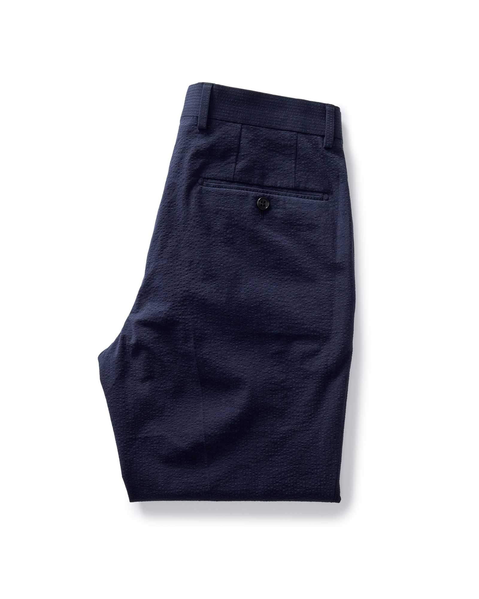 folded flatlay of the back of The Stevens Trouser in Navy Linen Seersucker, Bottoms by Taylor Stitch