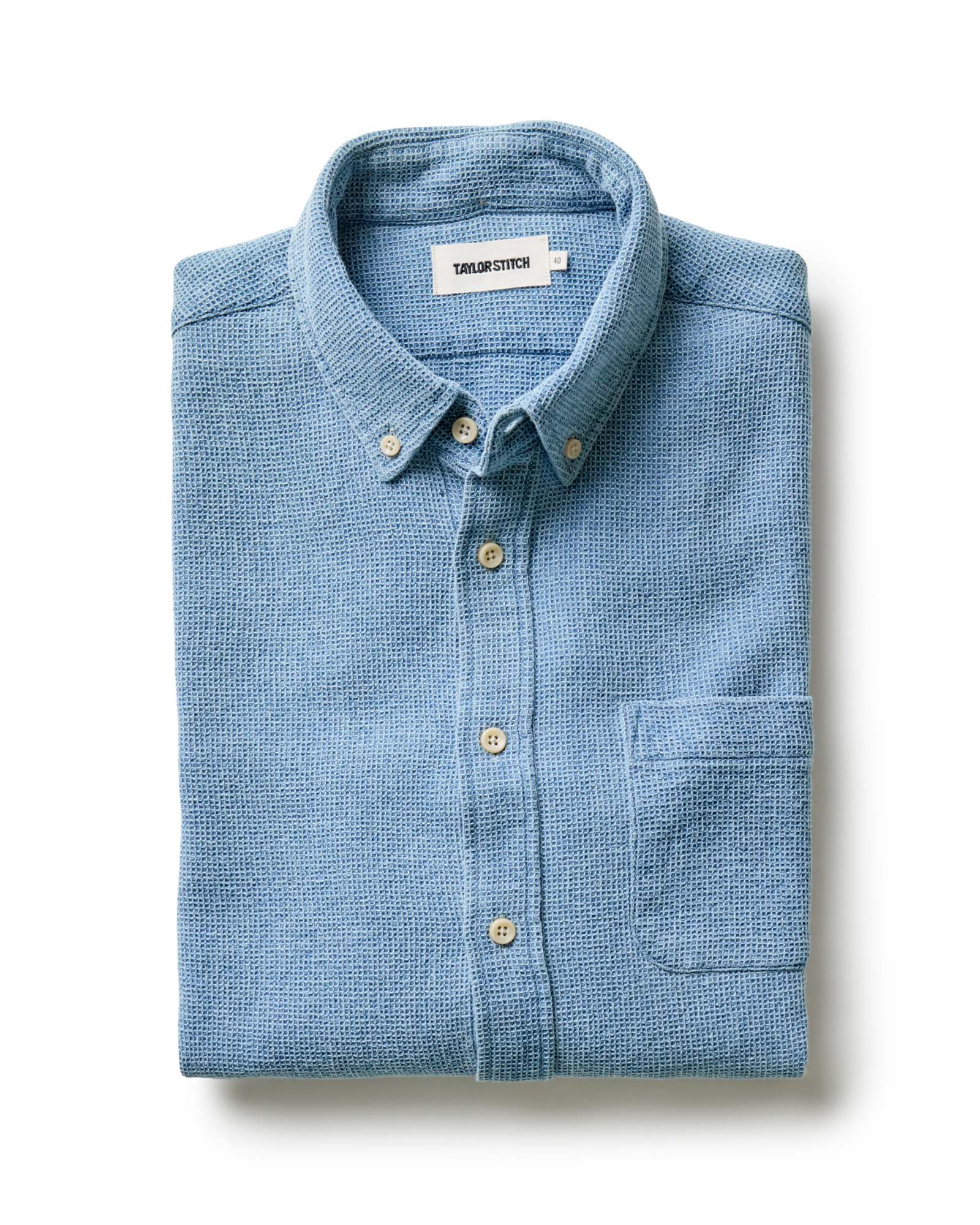 folded flatlay of The Jack in Washed Indigo Waffle, Wovens by Taylor Stitch