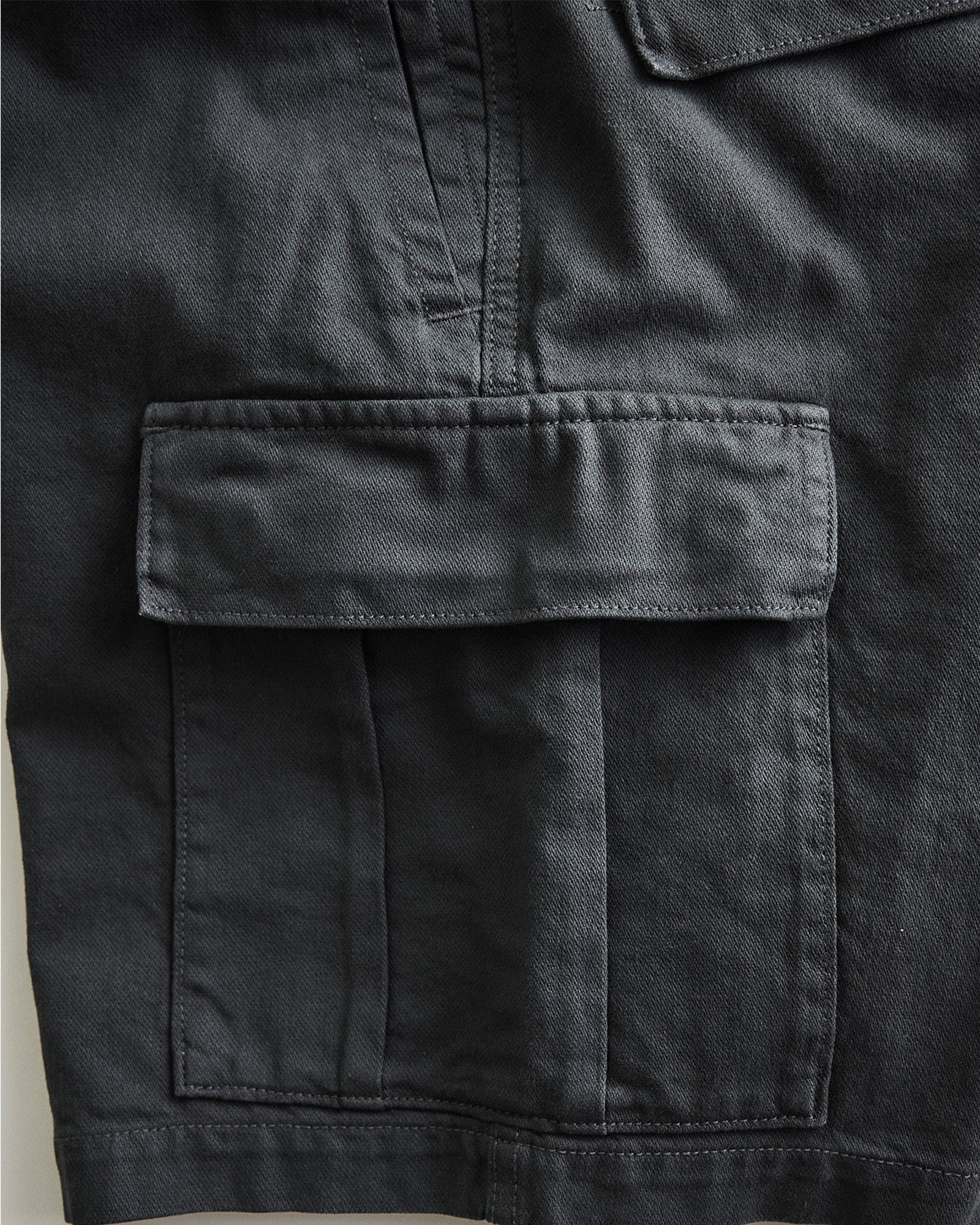 material shot of the pocket on The Tommie Short in Faded Black Broken Twill, Bottoms by Taylor Stitch