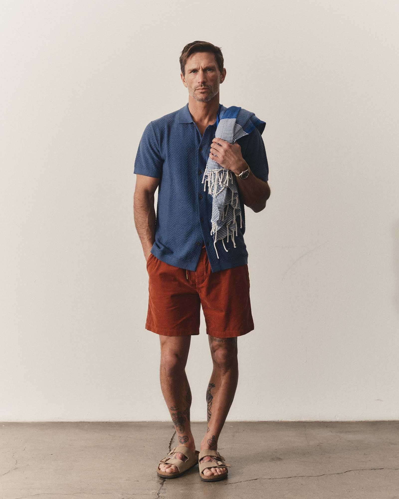 fit model posing in The Apres Short in Heather Chili Pincord, Bottoms by Taylor Stitch