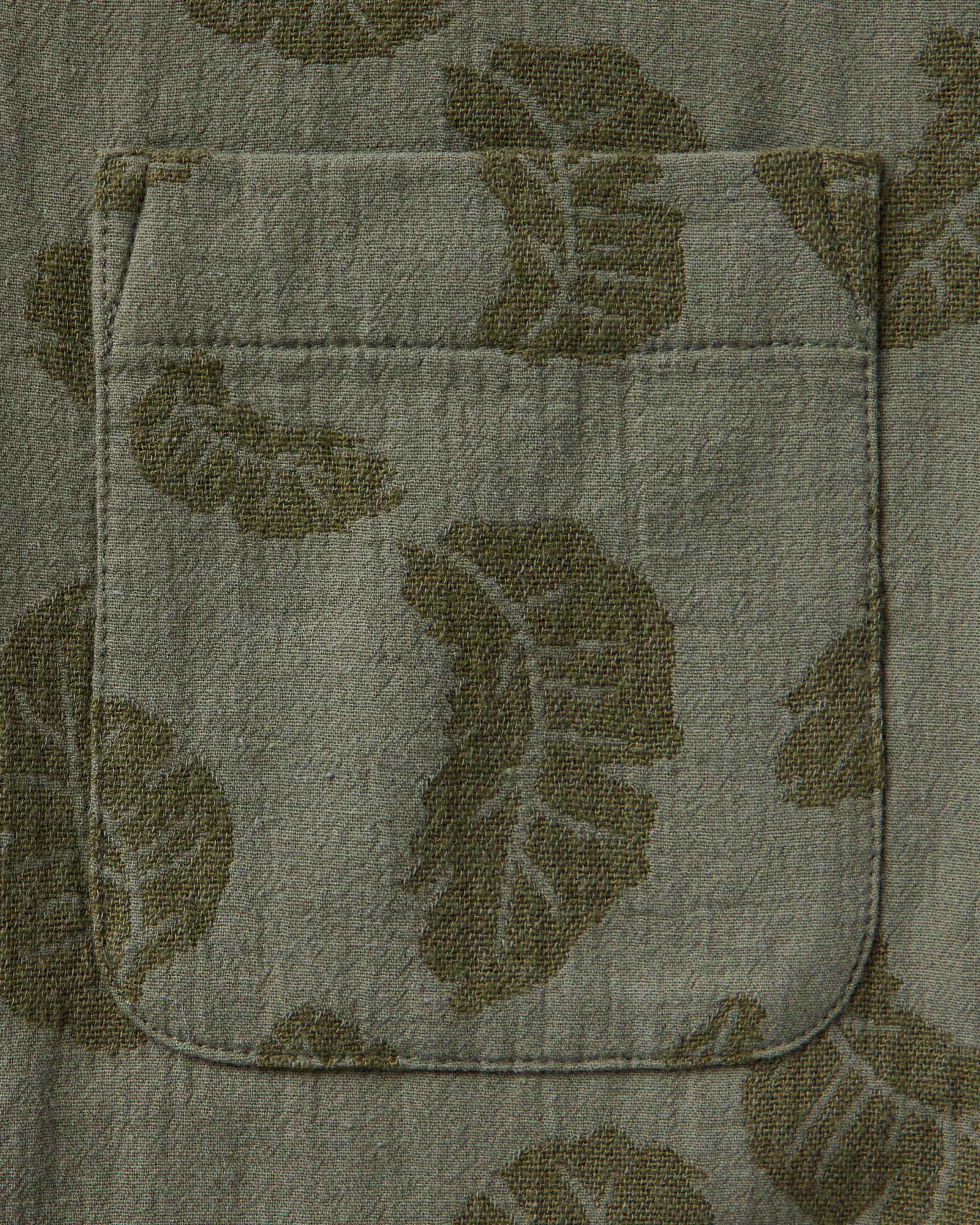 material shot of the pocket on The Hawthorne Shirt in Burnt Olive Floral Jacquard, Wovens by Taylor Stitch