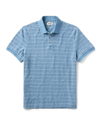 flatlay of The Pacific Polo in Washed Indigo Pique Stripe