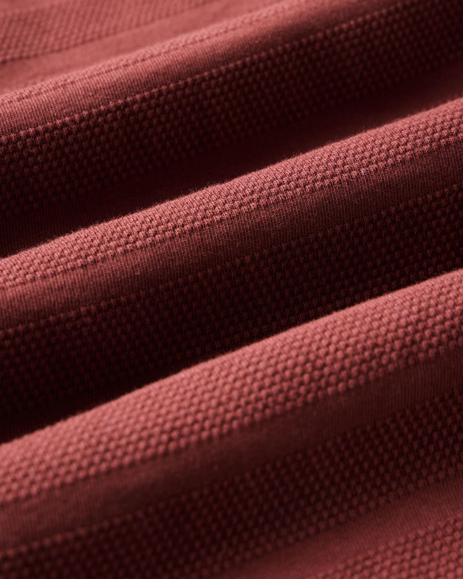 material shot of the fabric on The Bywater Polo in Burgundy Knit Stripe, Knits by Taylor Stitch