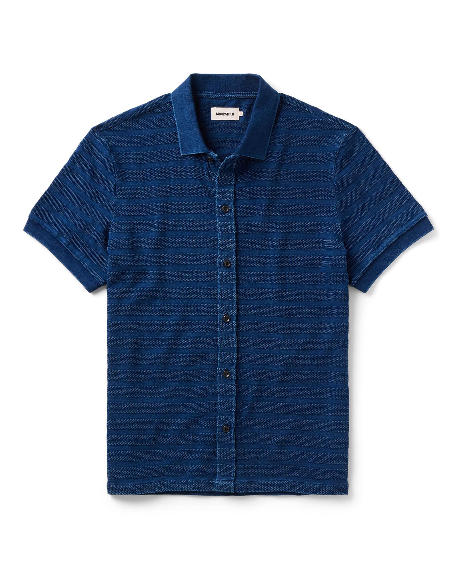 flatlay of The Bywater Polo in Rinsed Indigo Knit Stripe, Knits by Taylor Stitch