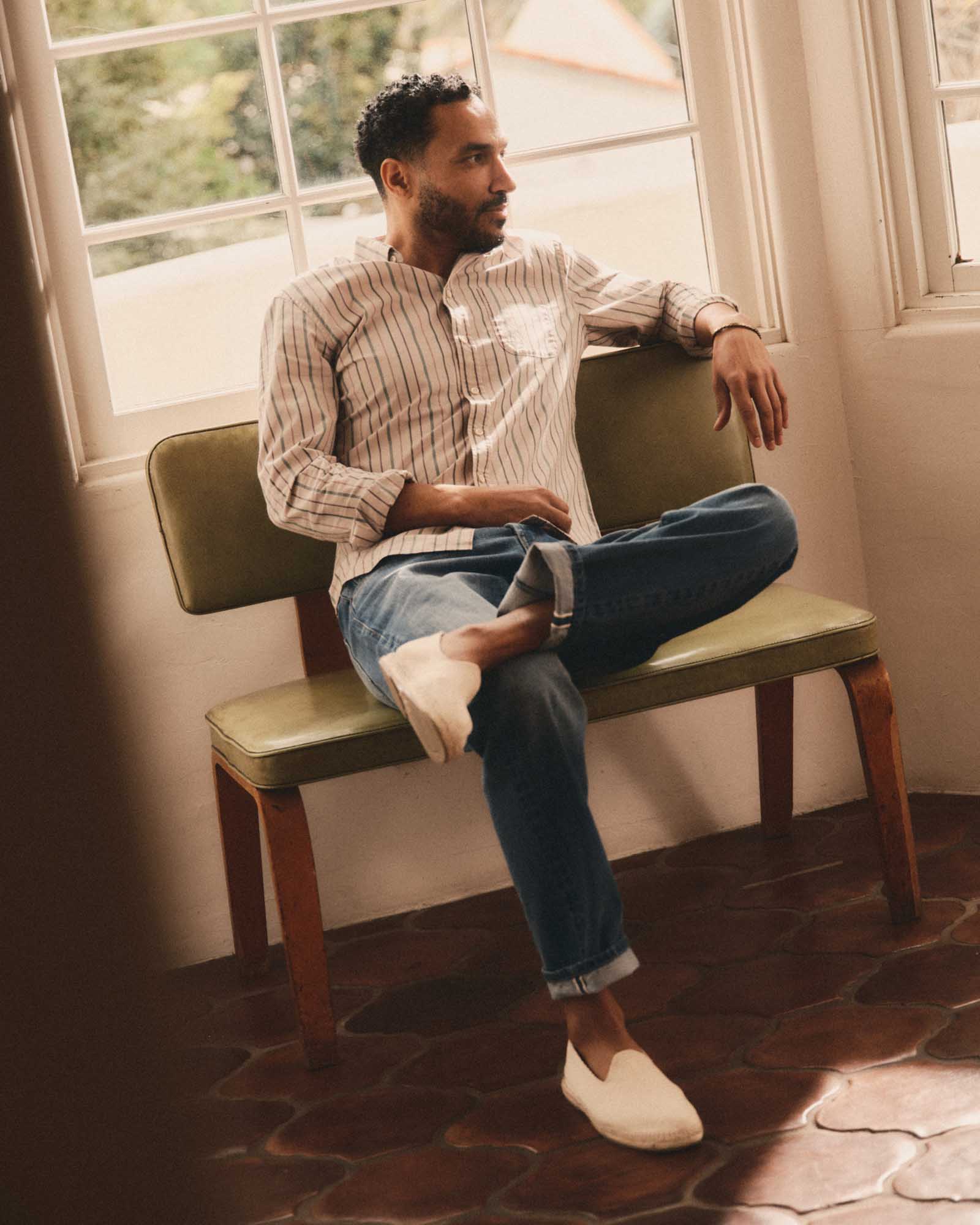 fit model sitting wearing The Jack in Algiers Stripe, Wovens by Taylor Stitch