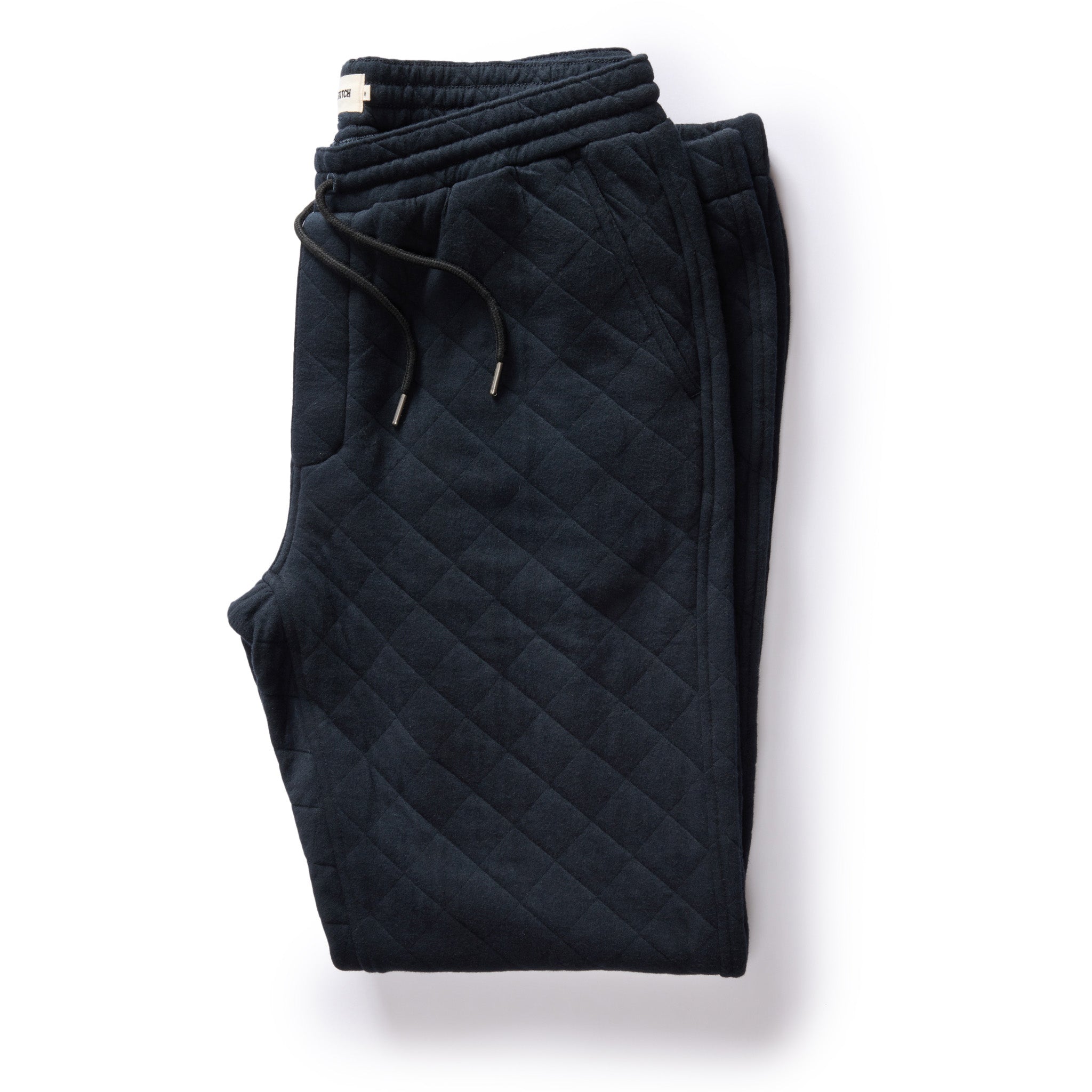 flatlay of The Quilted Jersey Pant in Midnight Heather, Bottoms by Taylor Stitch