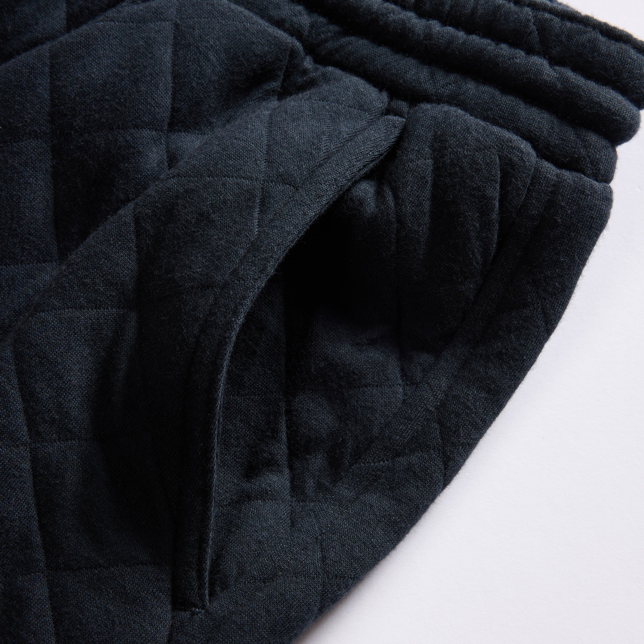 material shot of the pocket on The Quilted Jersey Pant in Midnight Heather, Bottoms by Taylor Stitch