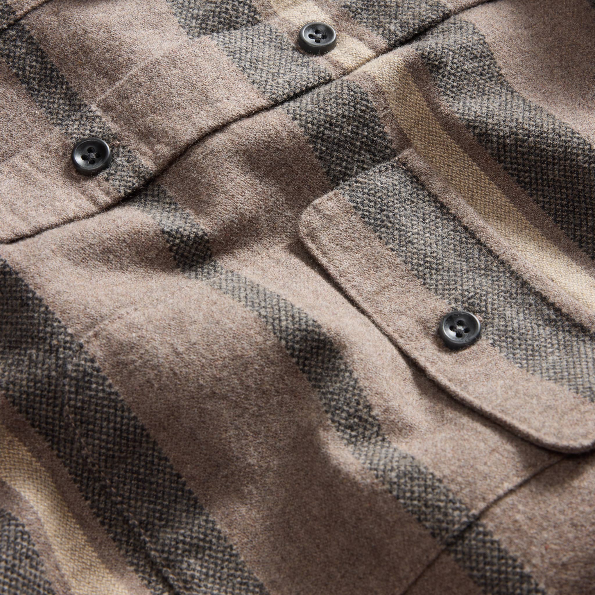 material shot of the buttons and chest pocket on The Yosemite Shirt in Graystone Heather Stripe, Wovens by Taylor Stitch