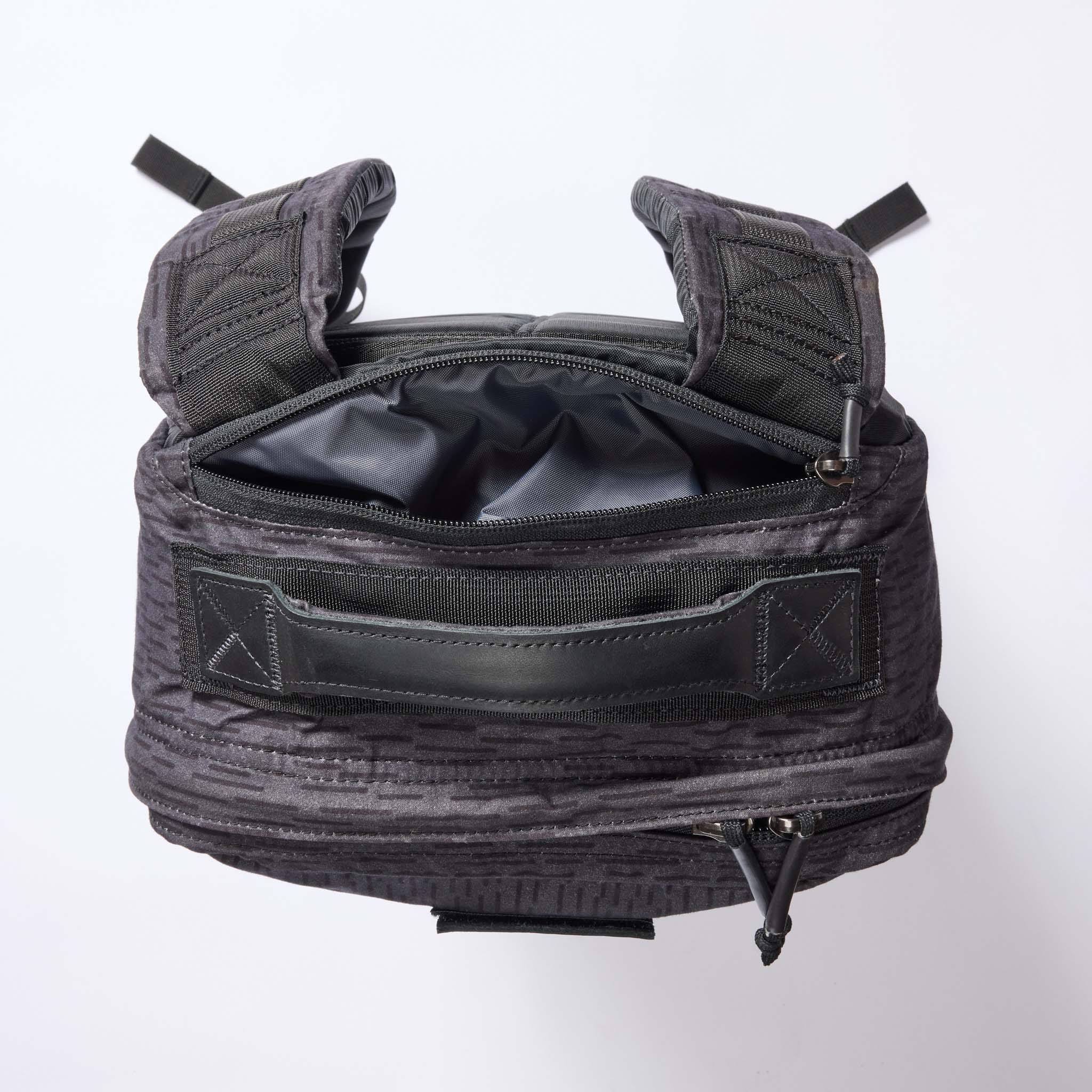 material shot of the back pocket of The GR1 USA in Raindrop Camo Ripstop WashWax, Accessories by Taylor Stitch