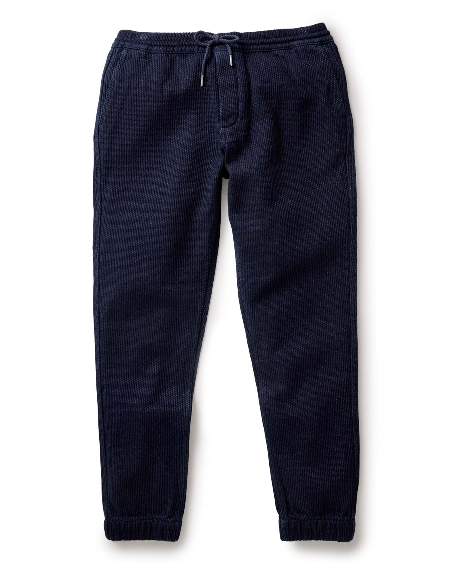 flatlay of The Apres Pant in Rinsed Indigo Sashiko, Bottoms by Taylor Stitch