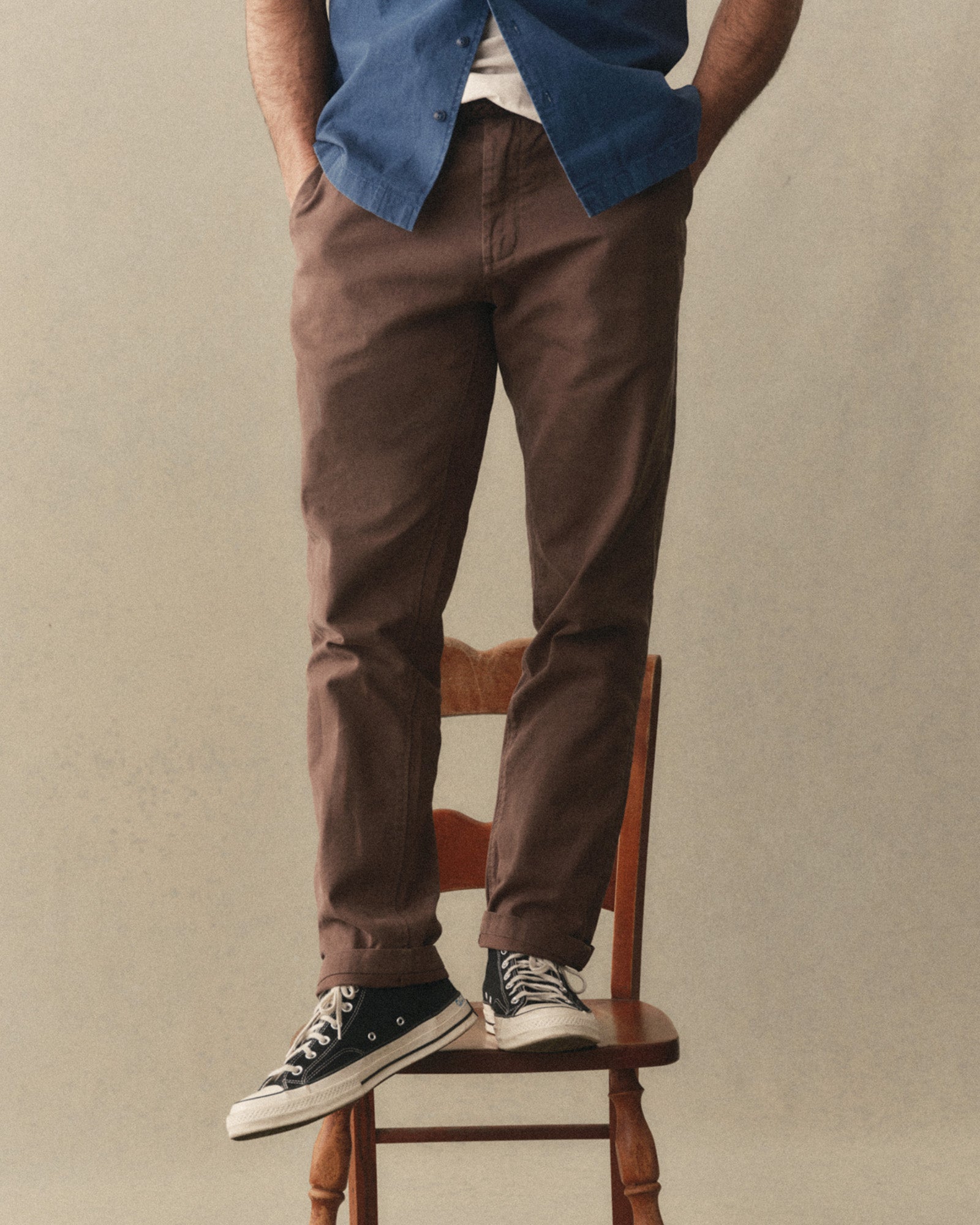 fit model standing wearing The Democratic Foundation Pant in Organic Espresso, Bottoms by Taylor Stitch