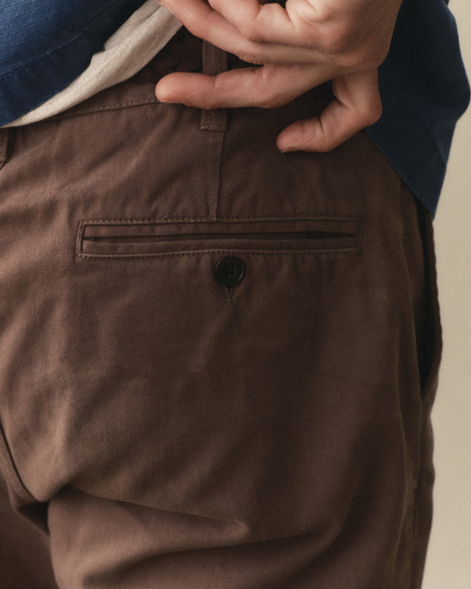 fit model showing off the back of The Democratic Foundation Pant in Organic Espresso, Bottoms by Taylor Stitch