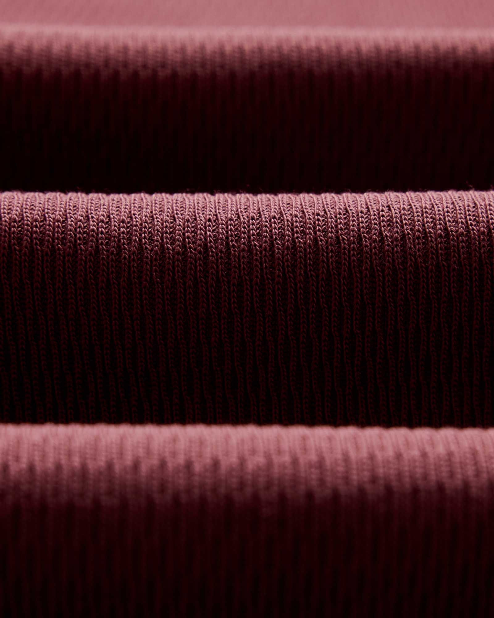 material shot of the waffle fabric on The Organic Cotton Short Sleeve Crew in Burgundy Waffle, Knits by Taylor Stitch