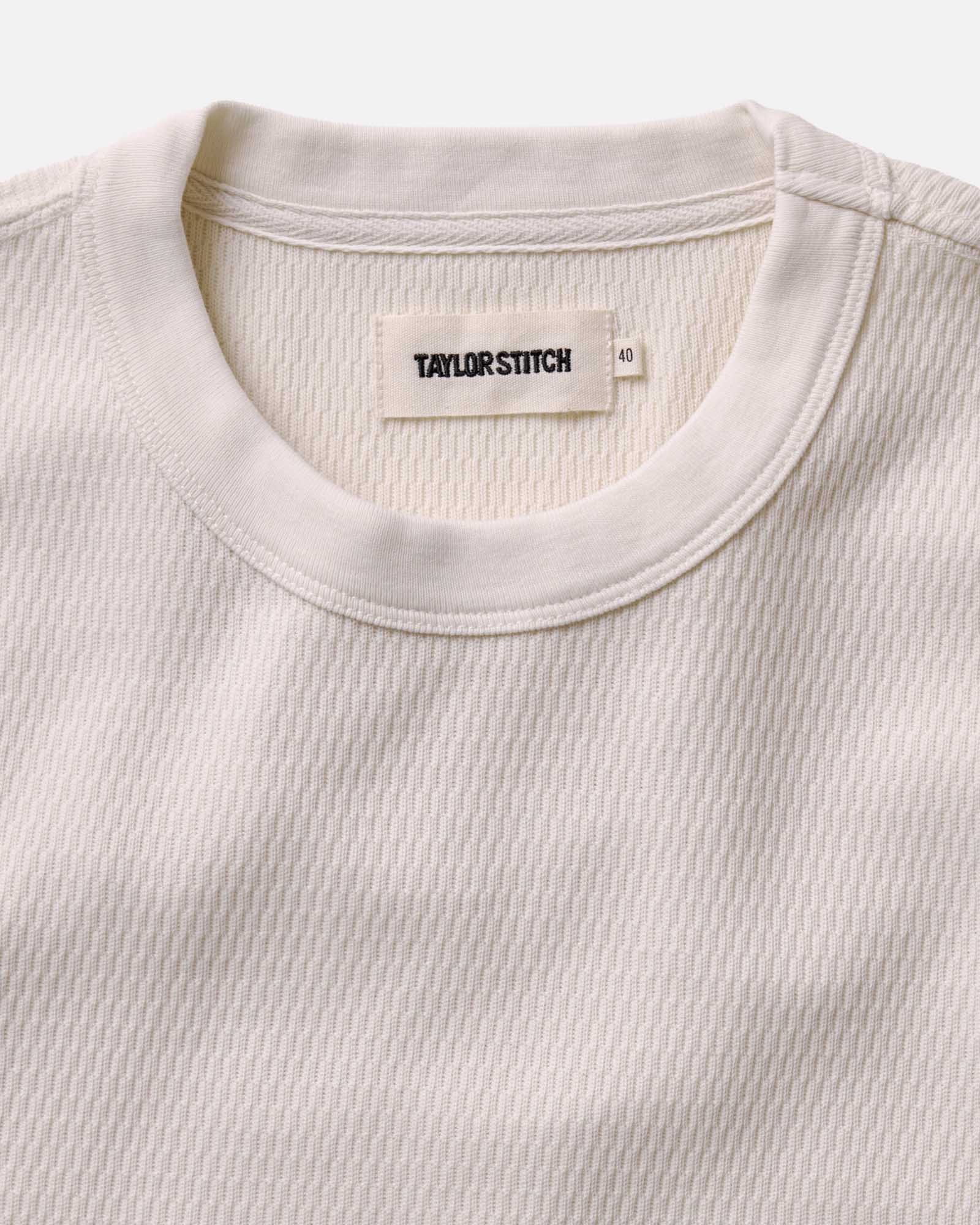 material shot of the collar on The Organic Cotton Short Sleeve Crew in Vintage White Waffle, Knits by Taylor Stitch