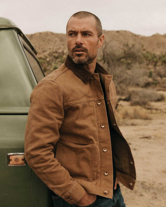 fit model posing in The Ryder Jacket in Tobacco Chipped Canvas