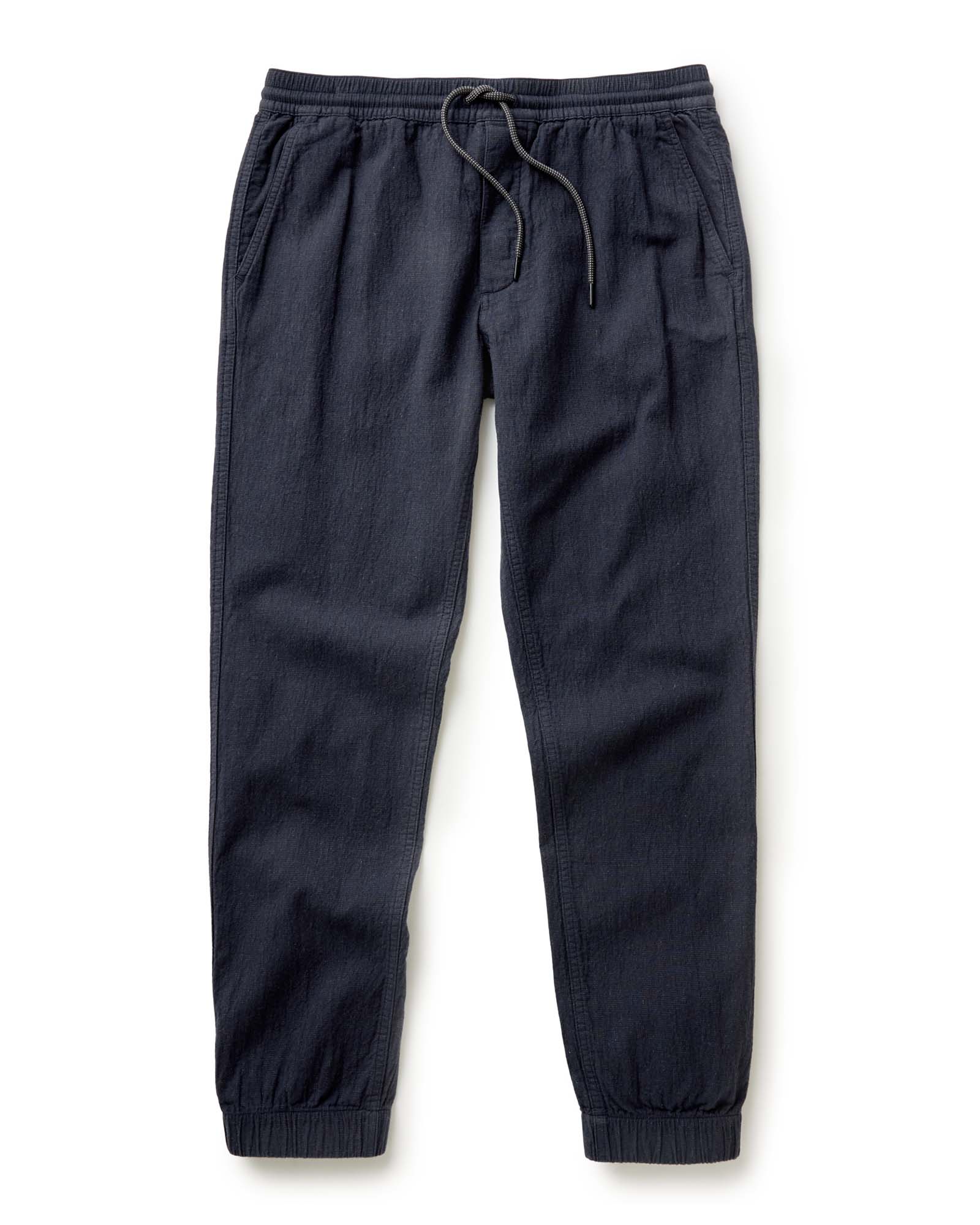 flatlay of The Apres Pant in Coal Double Cloth, Bottoms by Taylor Stitch