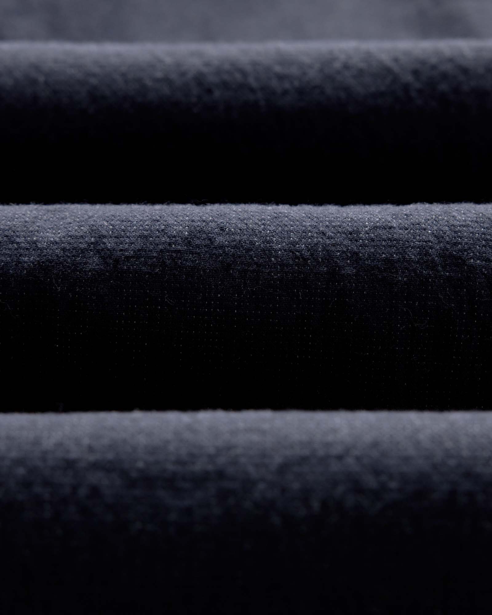 material shot of the fabric on The Apres Pant in Coal Double Cloth, Bottoms by Taylor Stitch