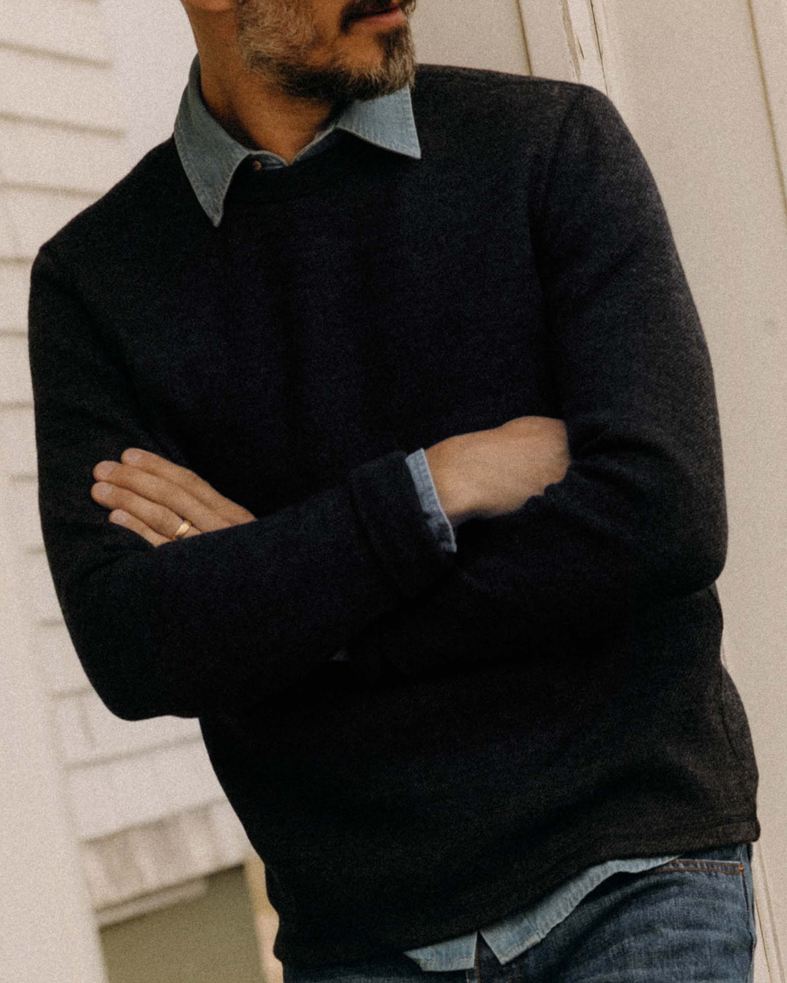 fit model with his arms crossed wearing The Evans Crew in Navy Birdseye Wool, Knits by Taylor Stitch