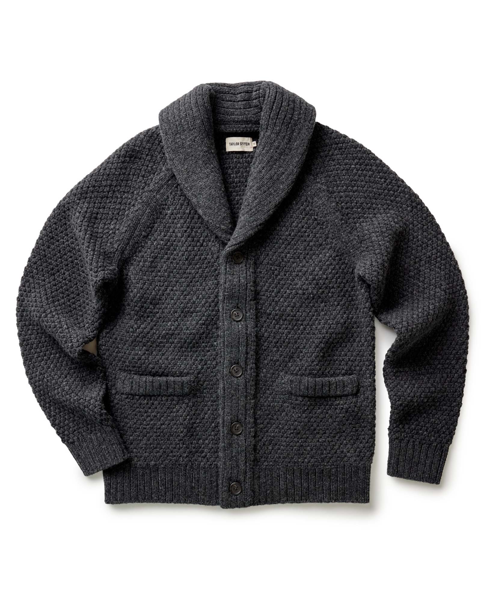 flatlay of The Fisherman Shawl Cardigan in Heather Coal Merino, Knits by Taylor Stitch