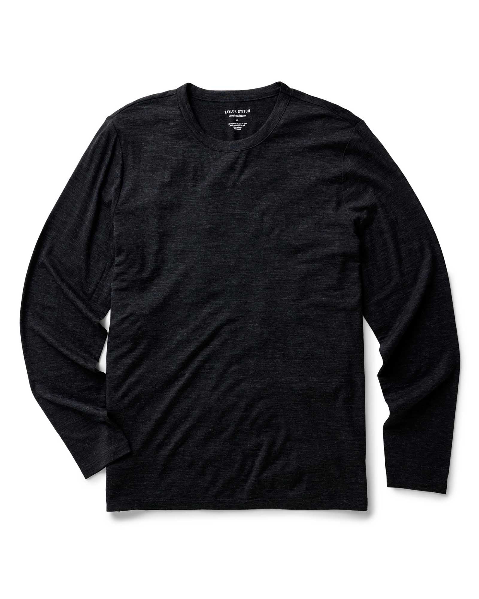 flatlay of The Merino Long Sleeve Tee in Heather Black, Knits by Taylor Stitch