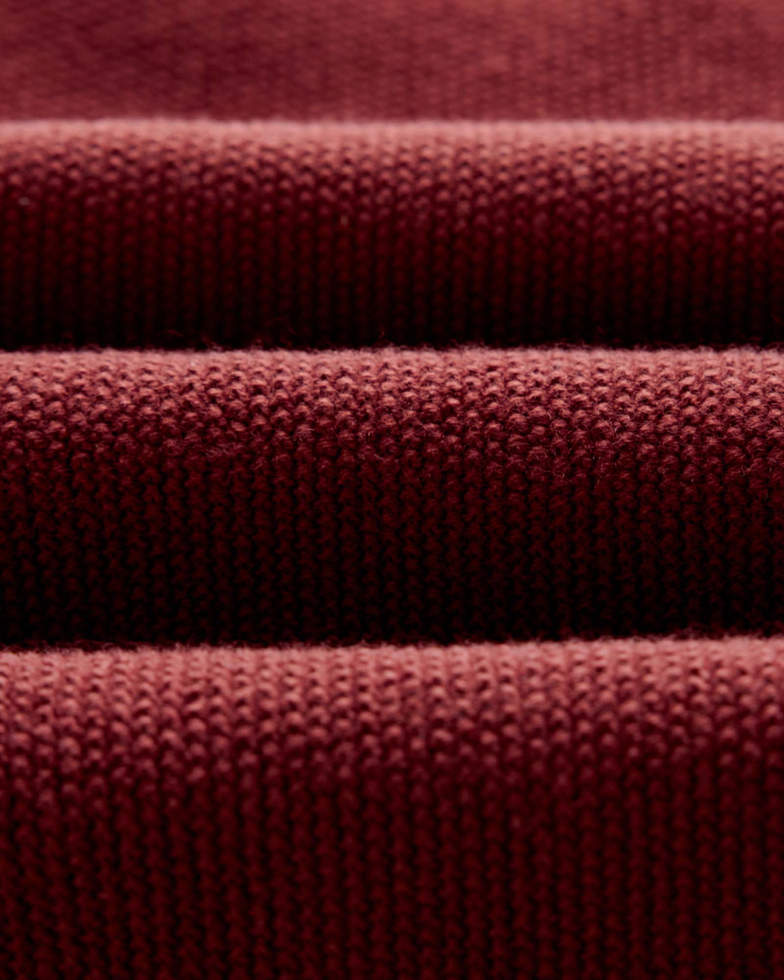 material shot of the fabric on The Newton Sweater Polo in Dried Cherry Merino, Knits by Taylor Stitch